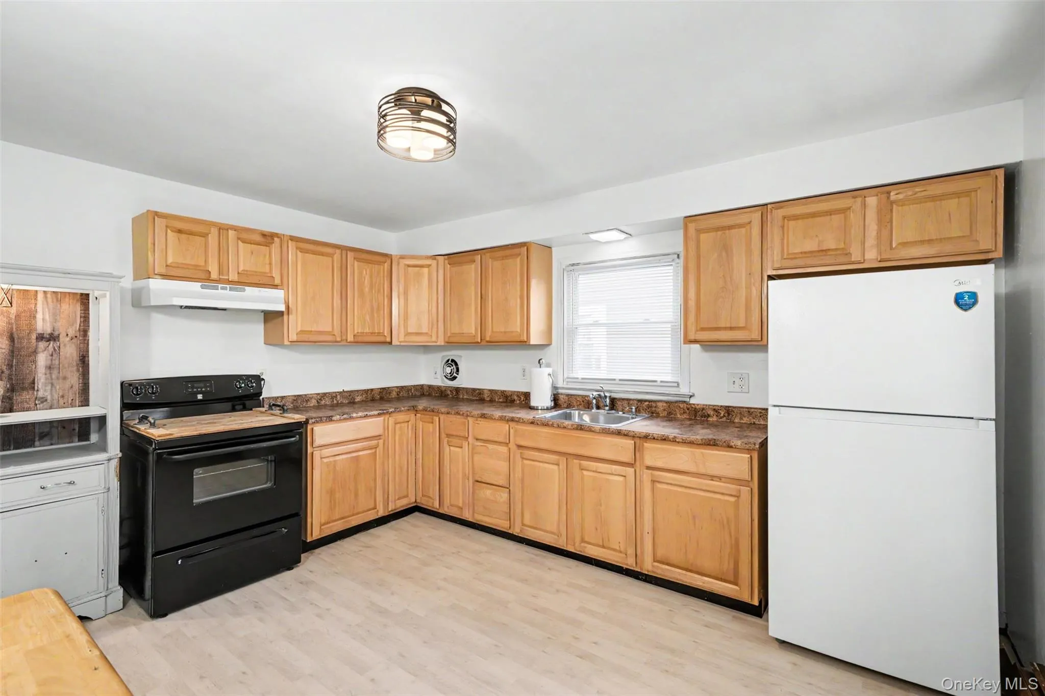 There is a large eat in kitchen There is a large eat in kitchen