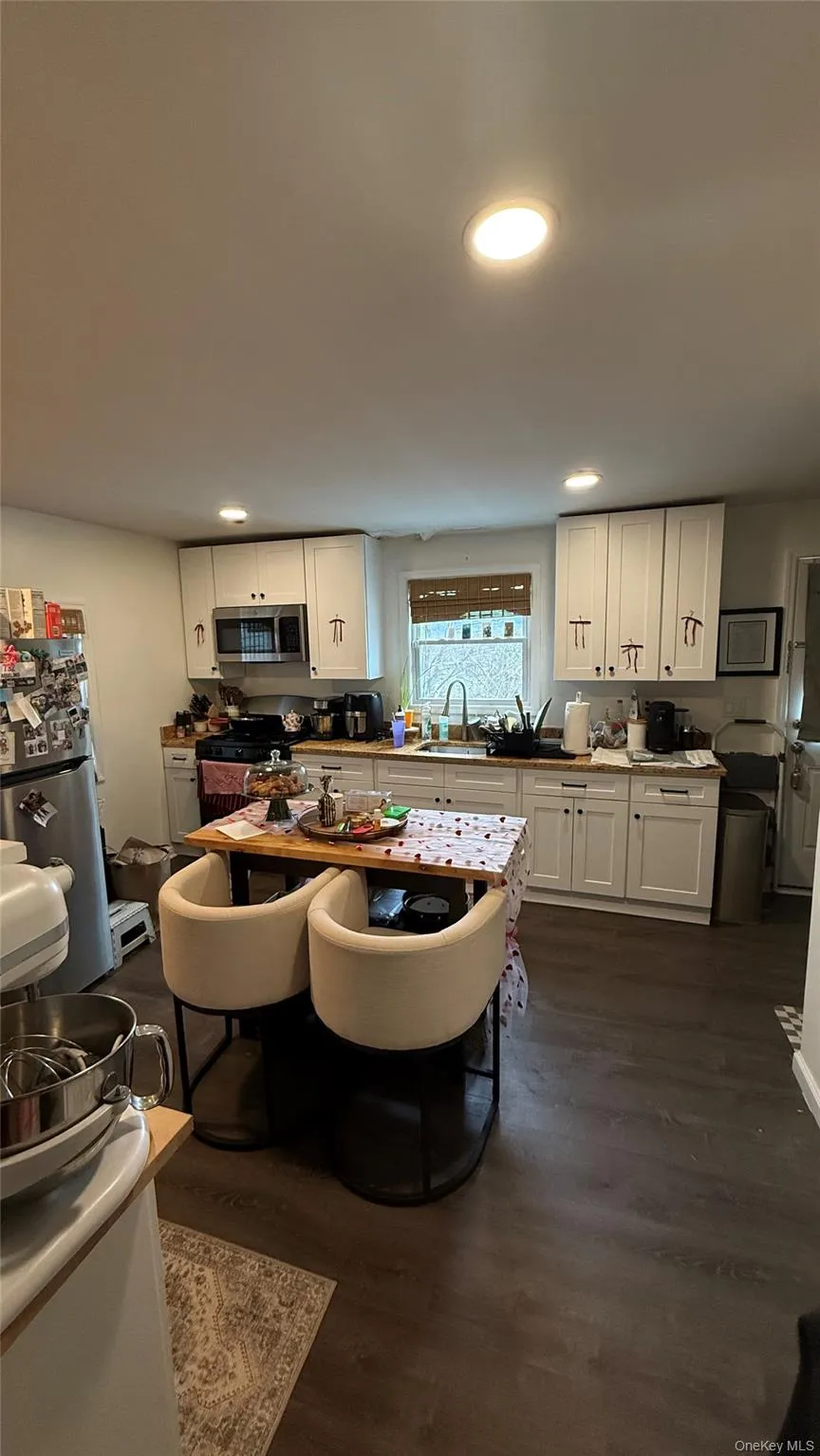 Large eat in kitchen with update appliances. Large eat in kitchen with update appliances.