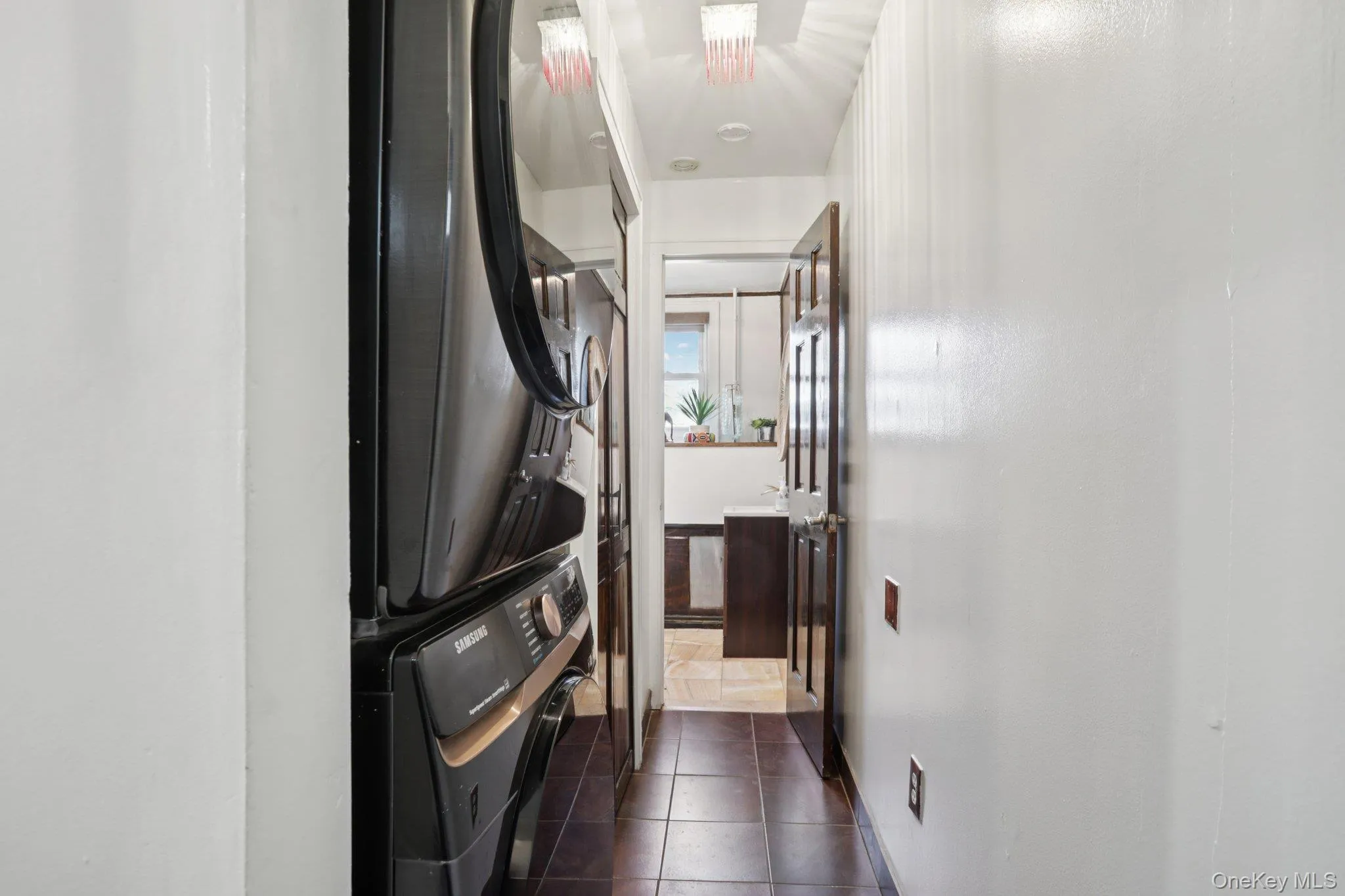 Laundry hall with access to first floor powder room Laundry hall with access to first floor powder room