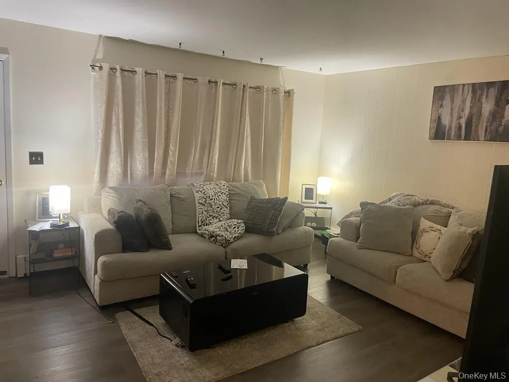 Living room with wood finished floors Living room with wood finished floors