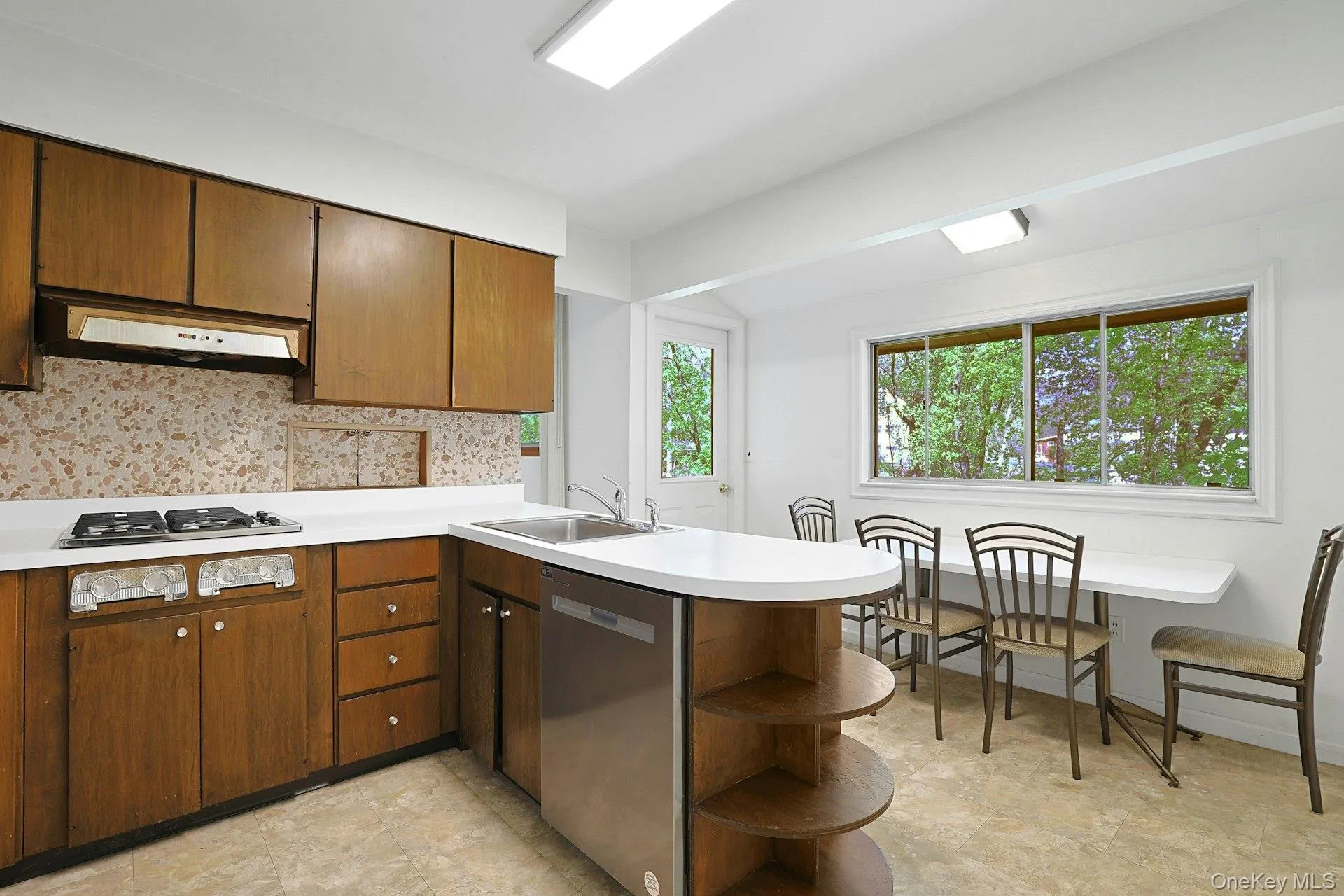 Eat in kitchen with picture window & door to the yard Eat in kitchen with picture window & door to the yard