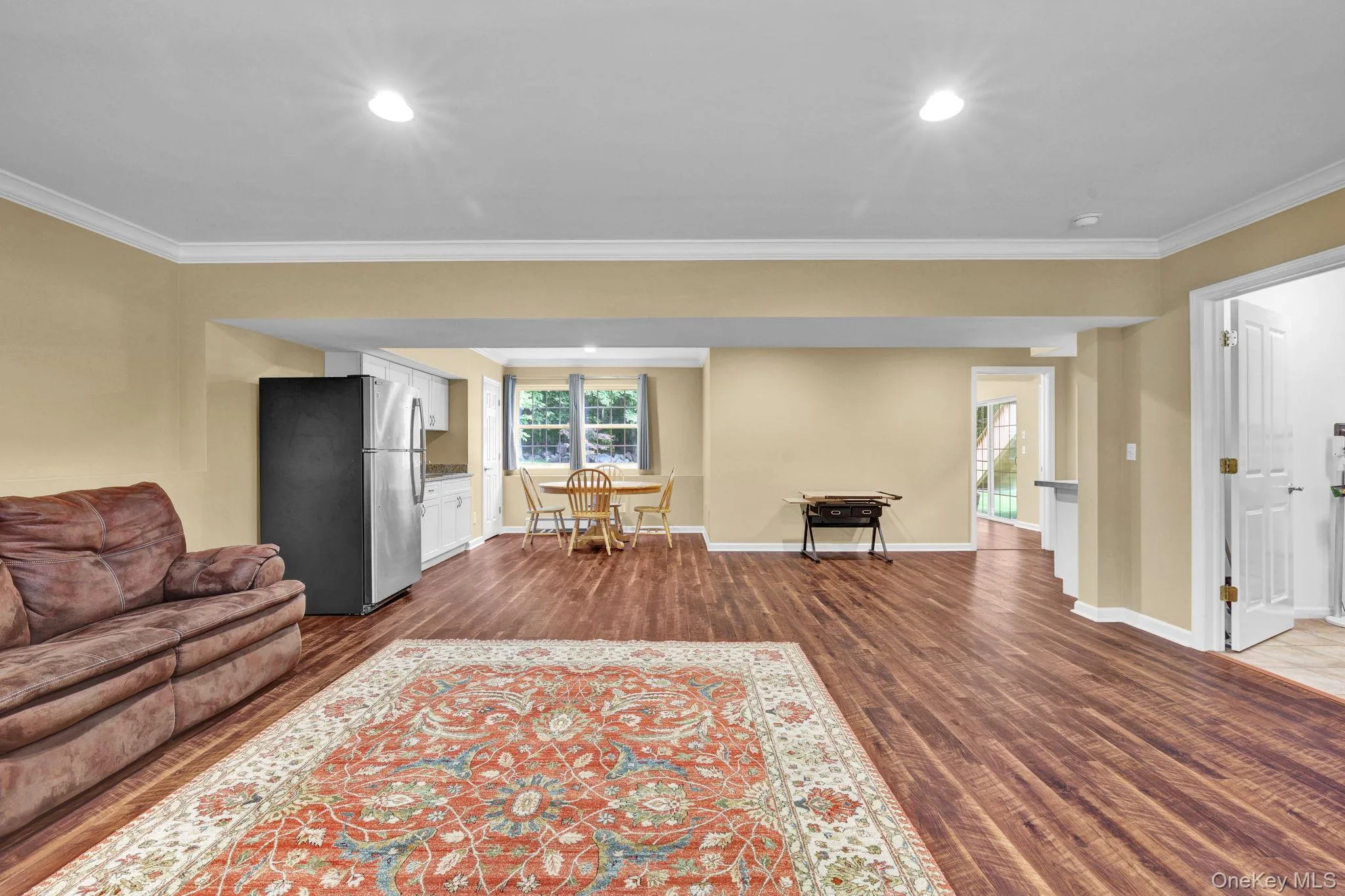 Spacious with wood-finish flooring, recessed lighting, and crown molding. Also access to laundry/mud room, and 2 car garage. Spacious with wood-finish flooring, recessed lighting, and crown molding. Also access to laundry/mud room, and 2 car garage.