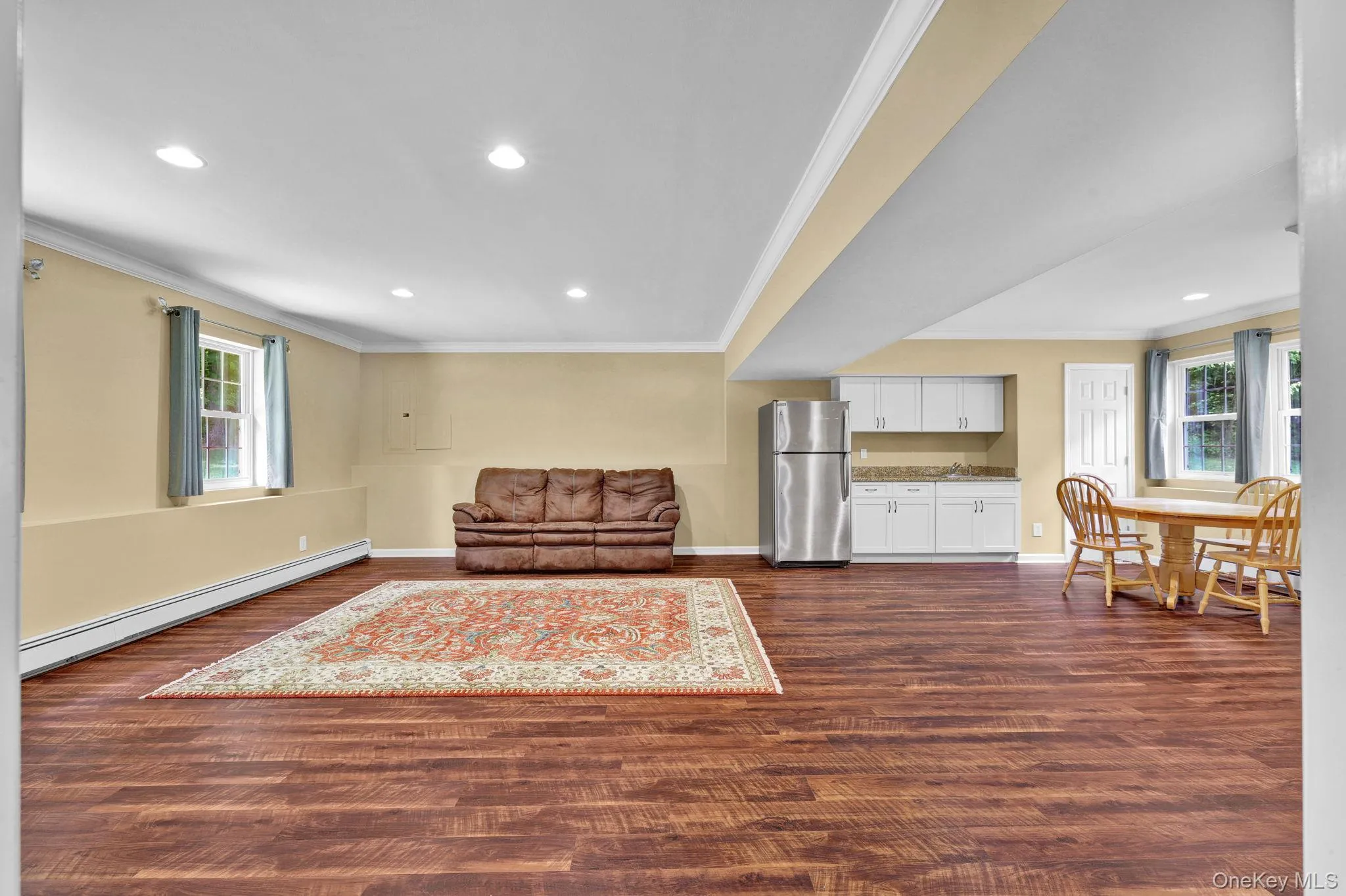 Another view of this newly renovated bright bonus space with engineered vinyl flooring. Another view of this newly renovated bright bonus space with engineered vinyl flooring.