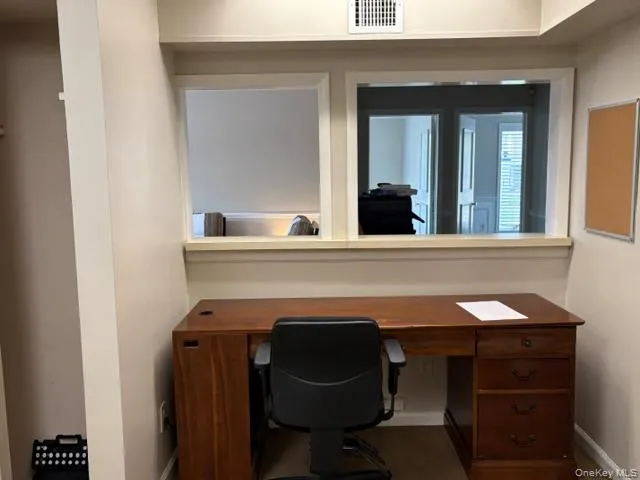 Reception w/pass thru welcome window. Reception w/pass thru welcome window.