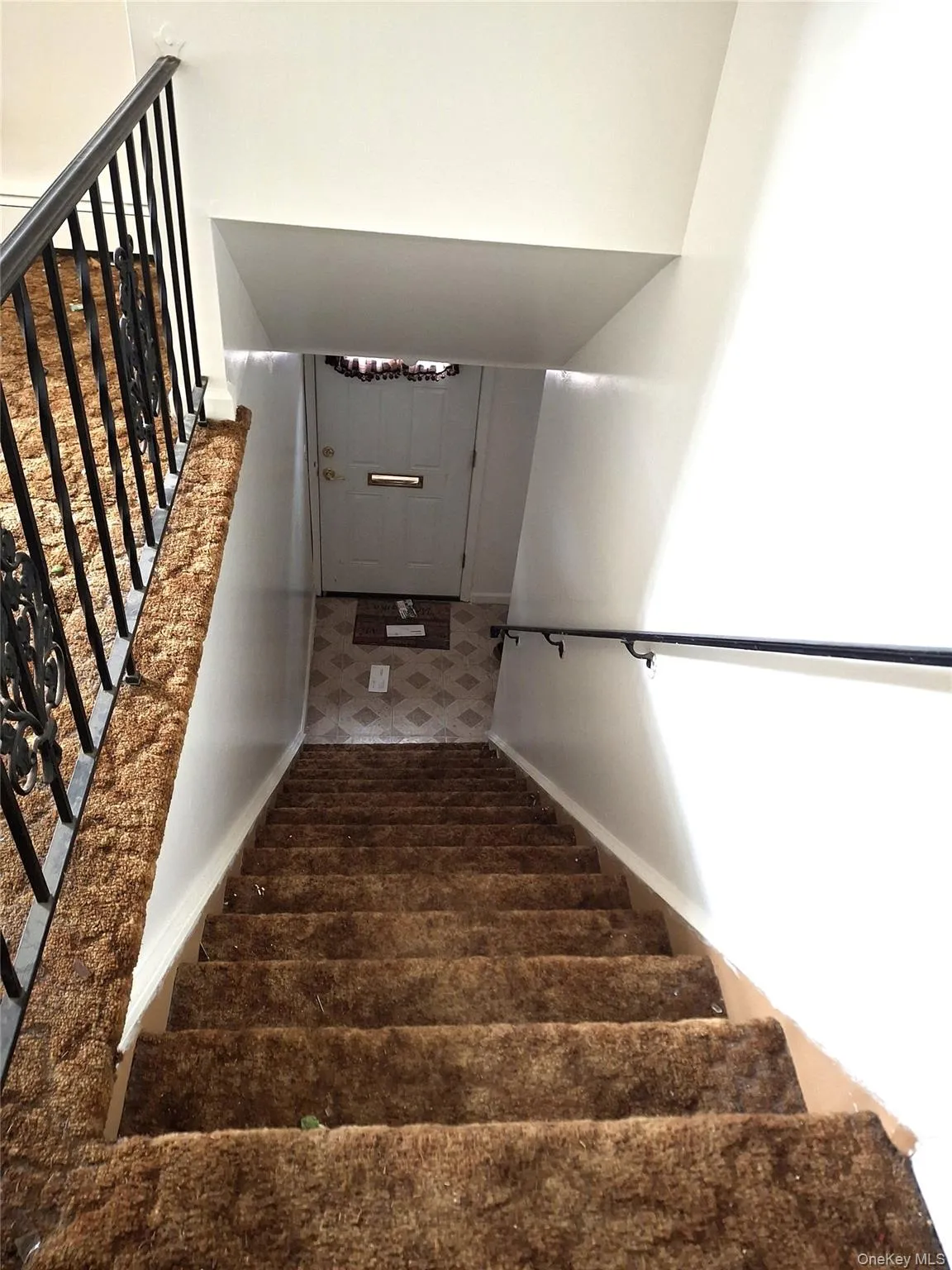 Entrance to the Second Floor Condominium Entrance to the Second Floor Condominium