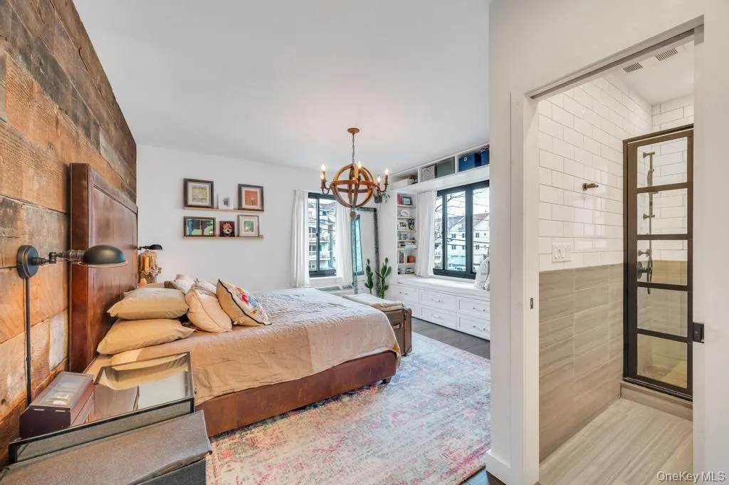 Primary Bedroom with Ensuite Bathroom and Built-Ins Primary Bedroom with Ensuite Bathroom and Built-Ins