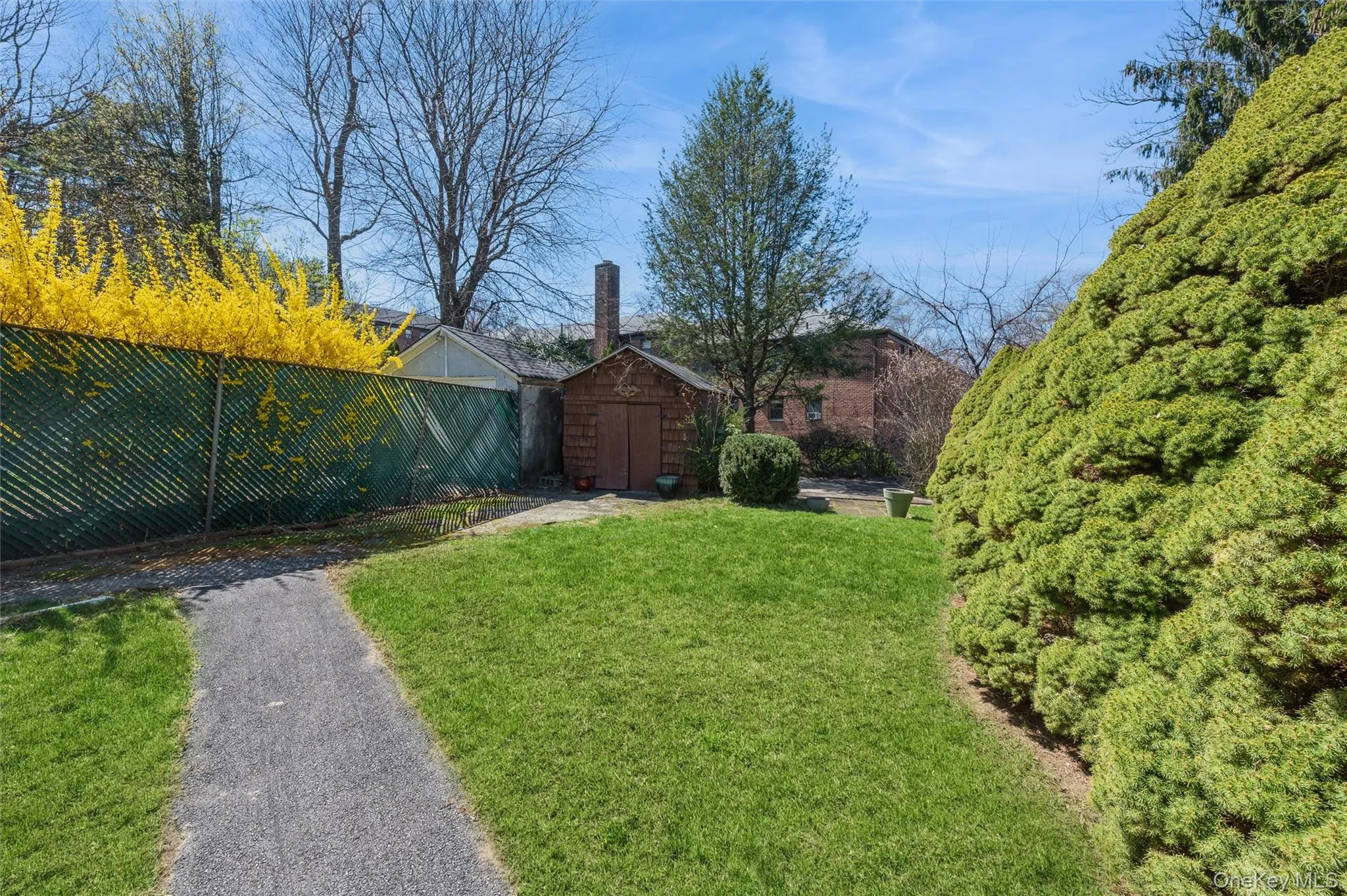 Private Backyard With Storage Barn and Patio Area Private Backyard With Storage Barn and Patio Area