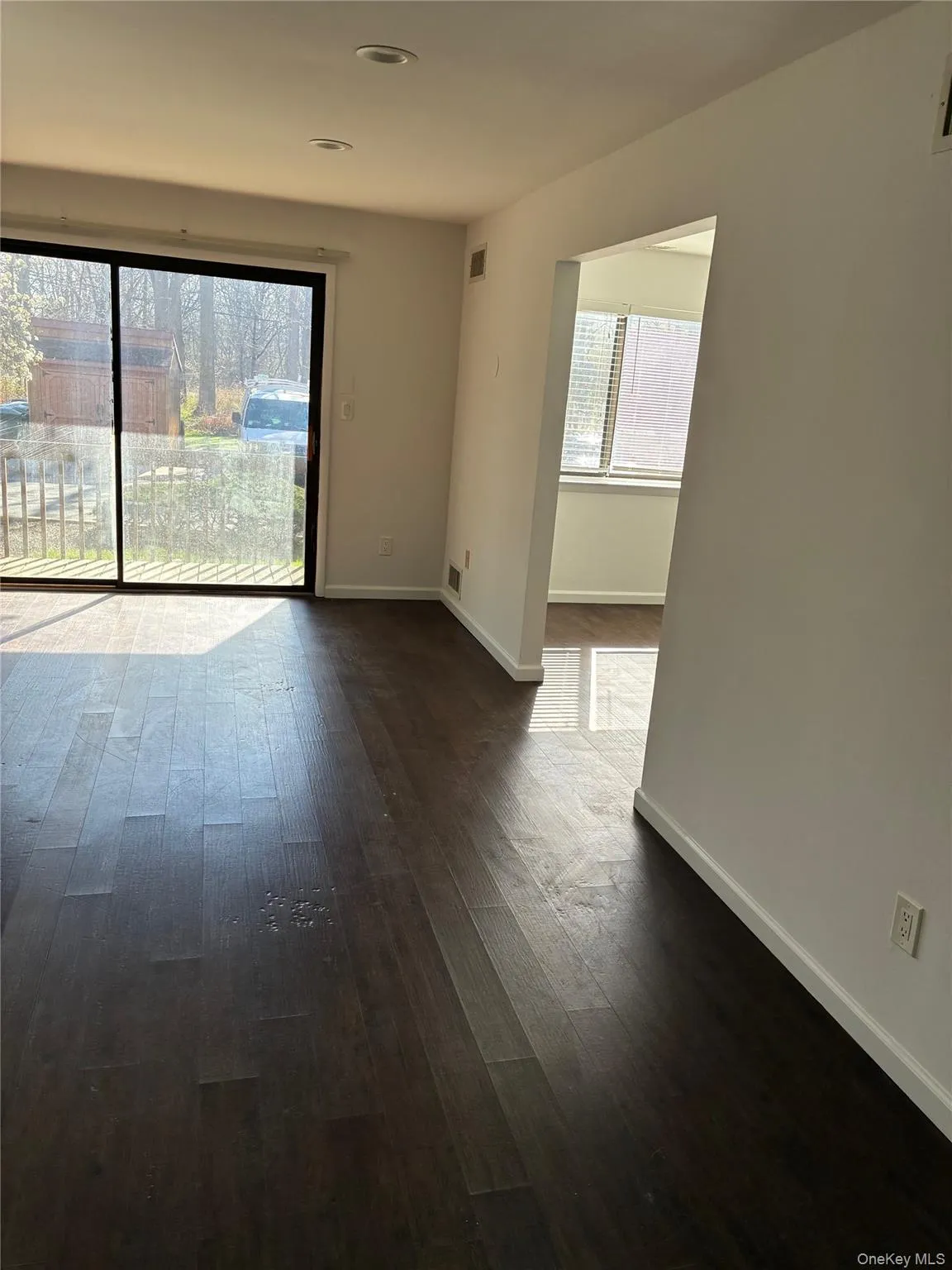 showing sliding doors and entrance to dining area showing sliding doors and entrance to dining area