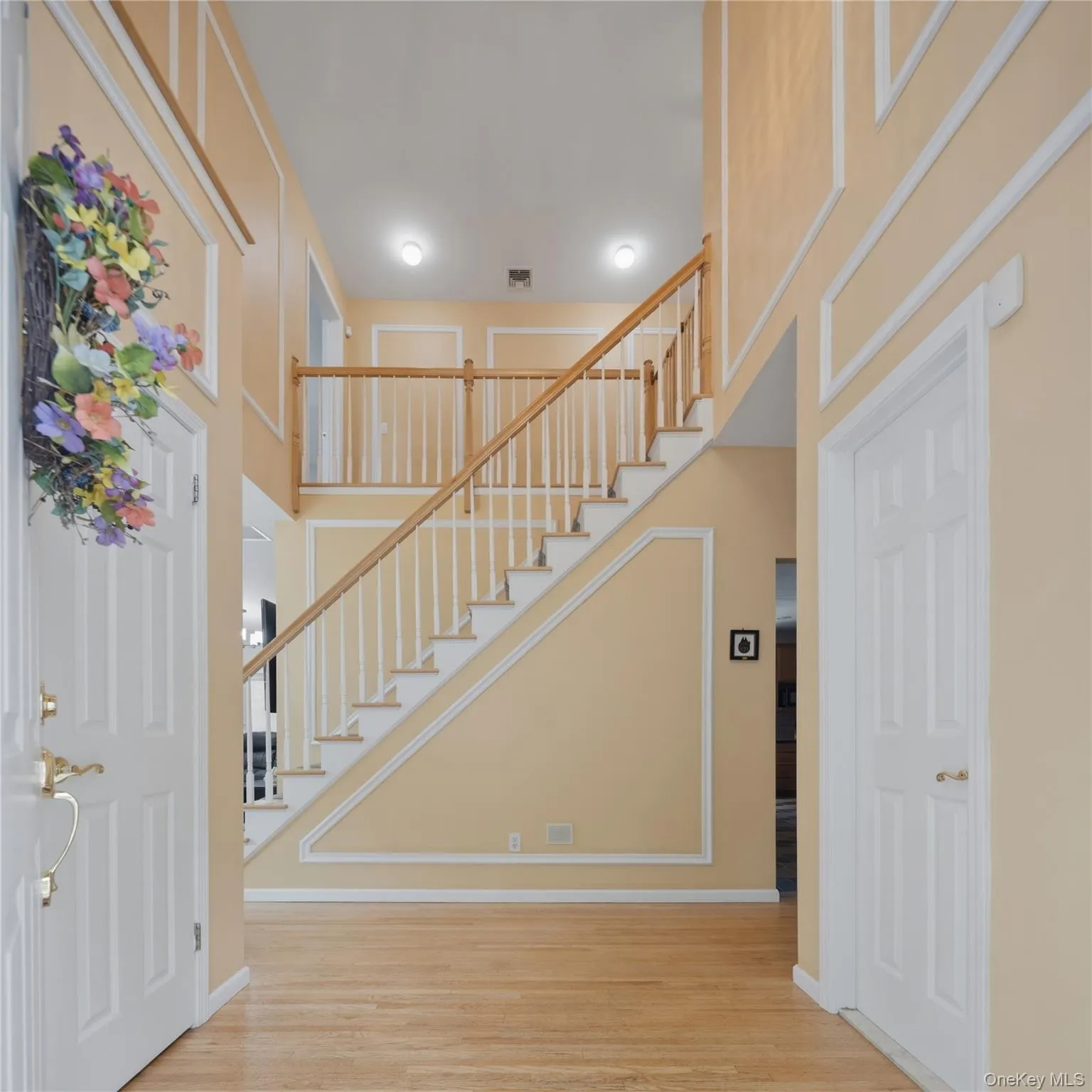 Open foyer with dual closets Open foyer with dual closets