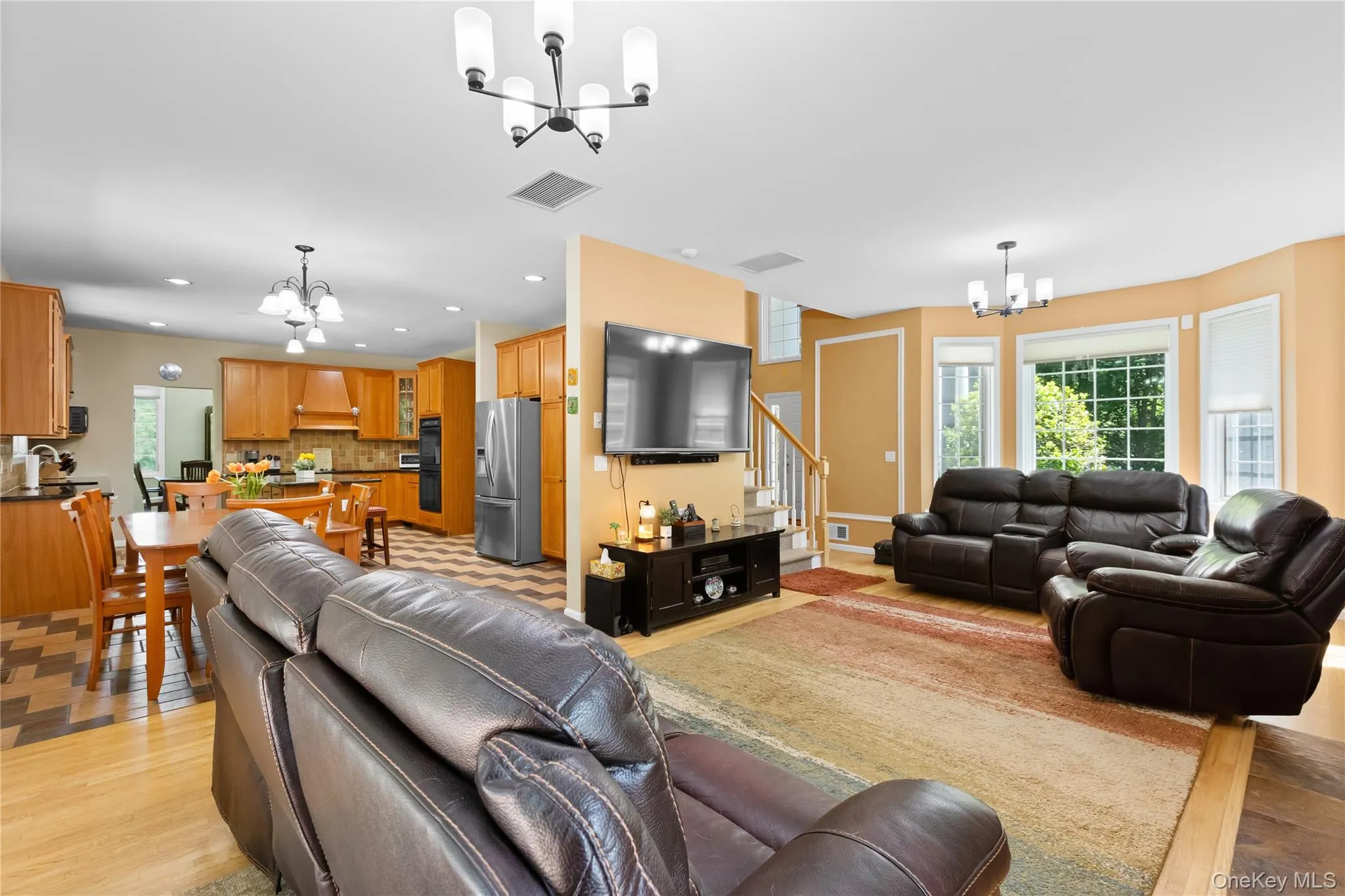 Open EIK to family room with fire place with beautiful bay window Open EIK to family room with fire place with beautiful bay window