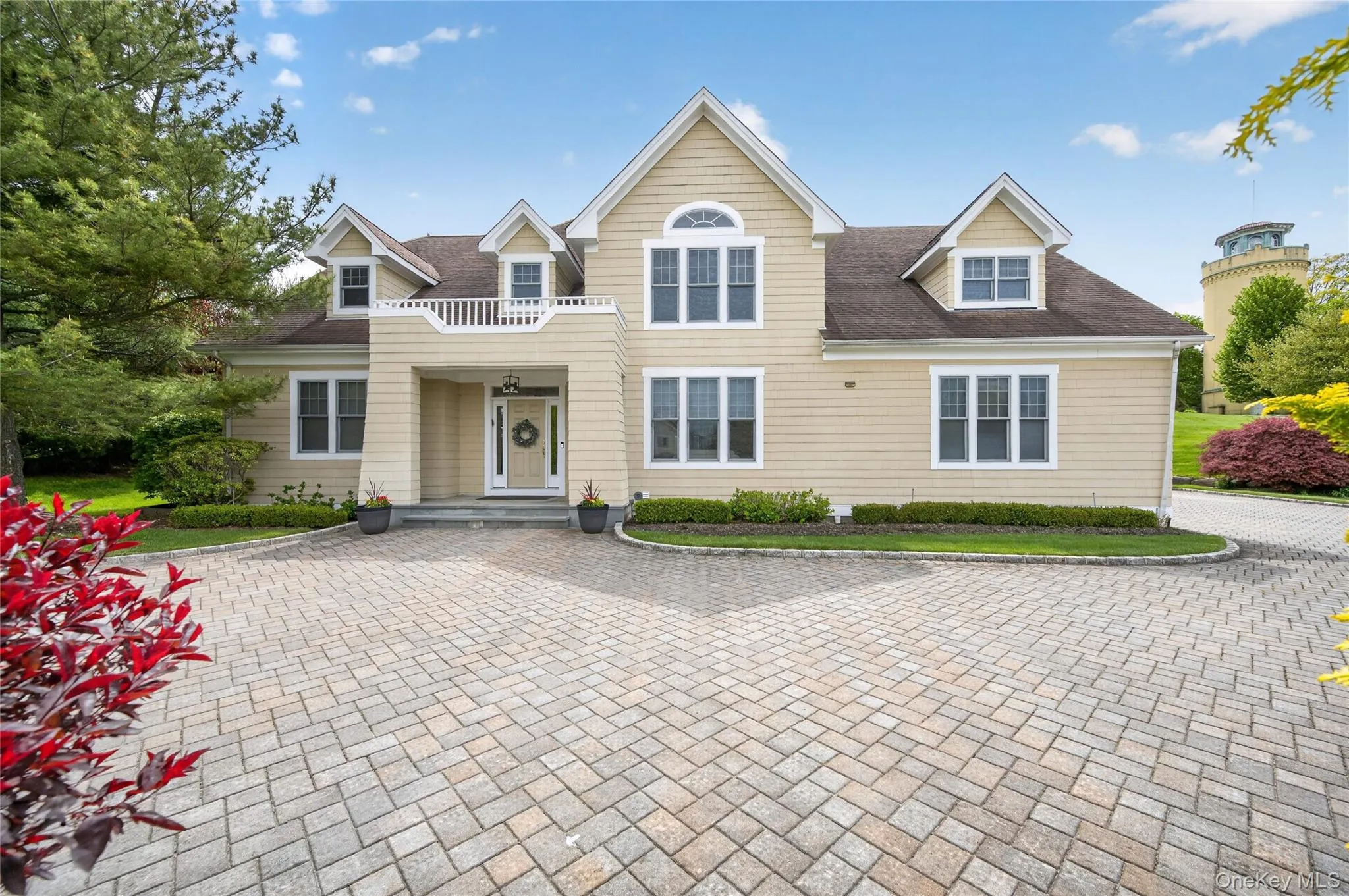 Front of home with beautiful pavers Front of home with beautiful pavers
