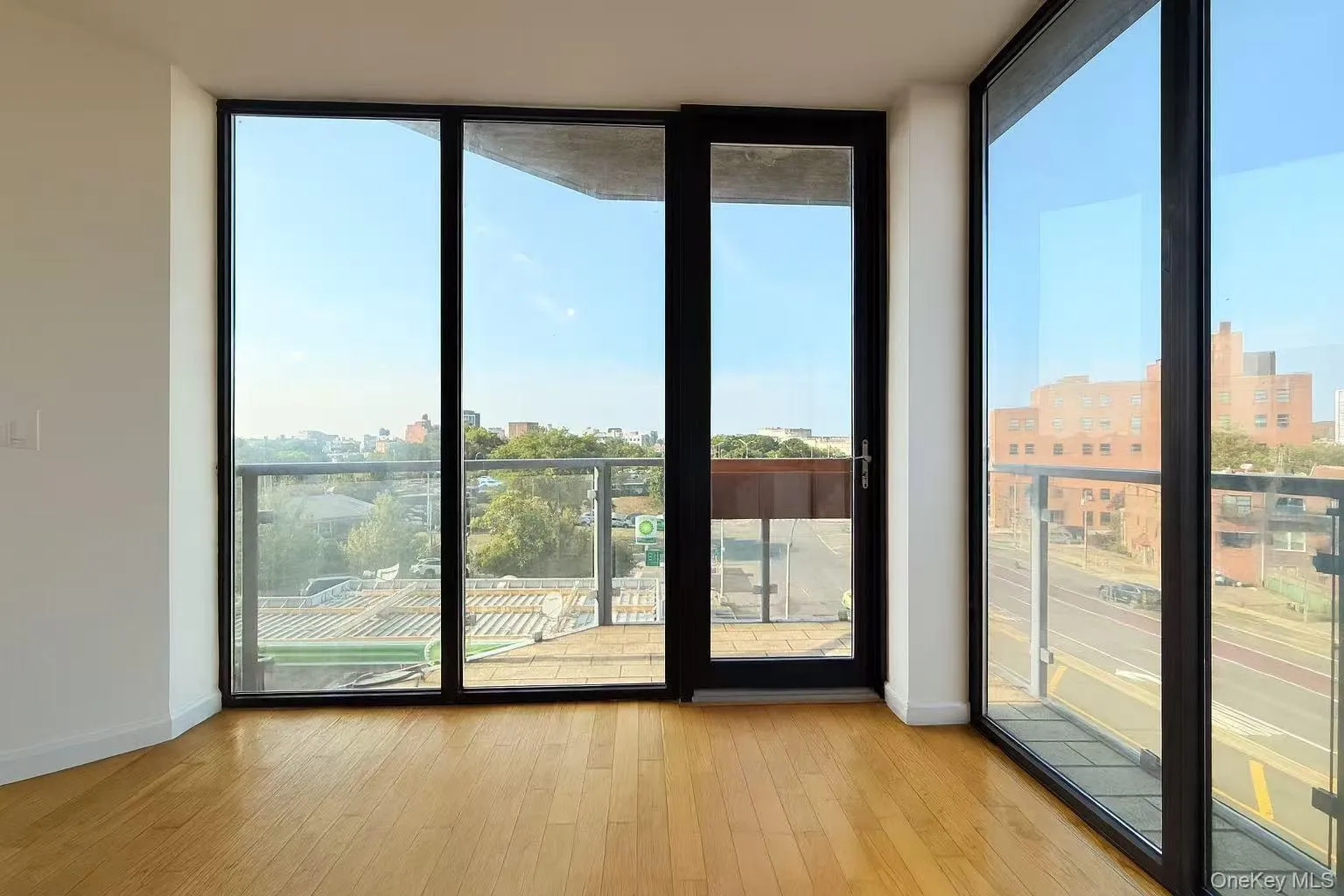 Unfurnished sunroom with a city view Unfurnished sunroom with a city view