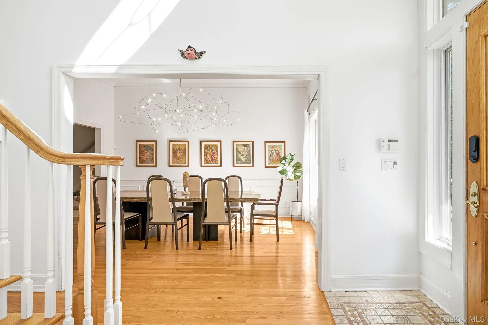 View of the formal dining room from the foyer. View of the formal dining room from the foyer.