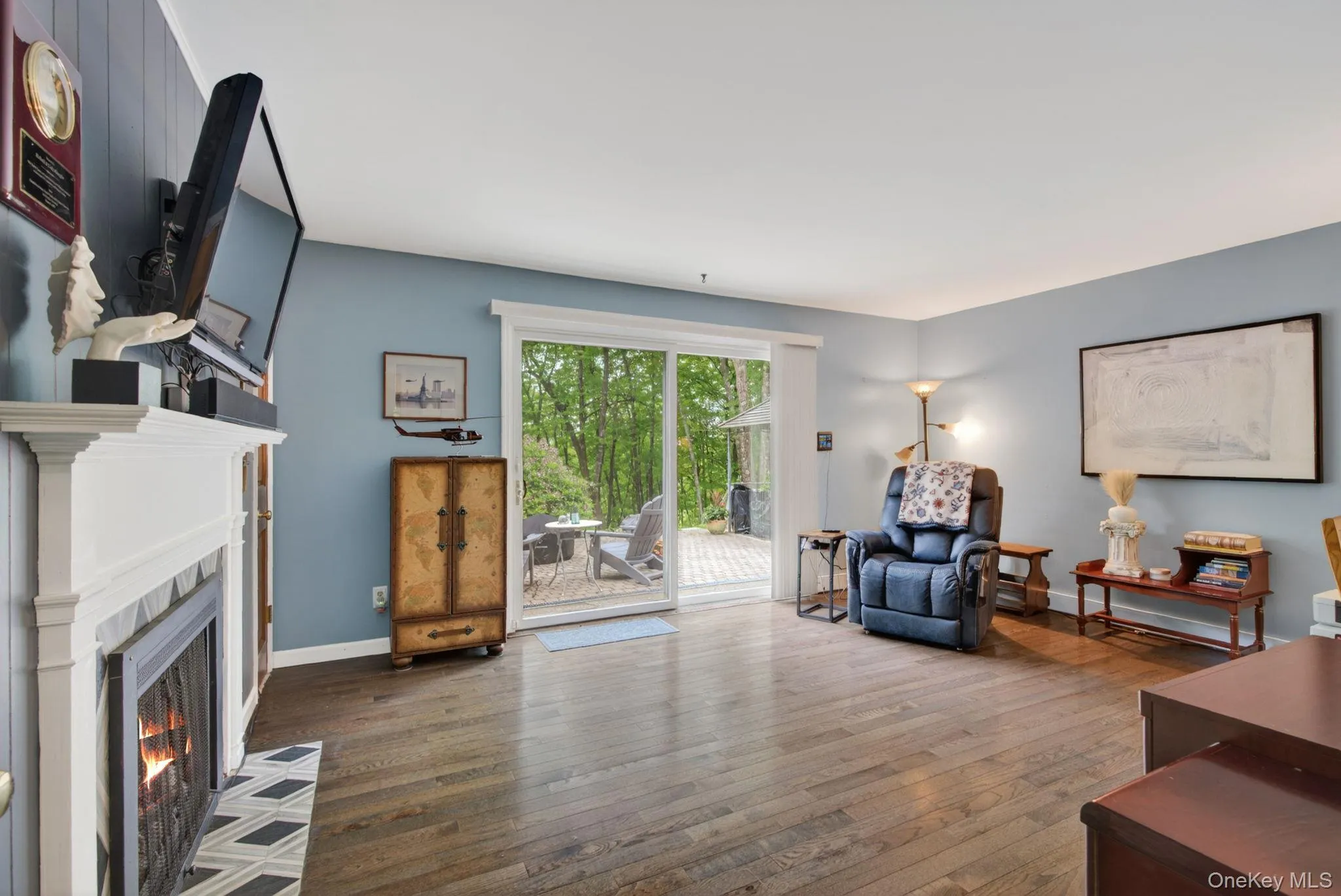 Family Room with fireplace and glass sliders Family Room with fireplace and glass sliders