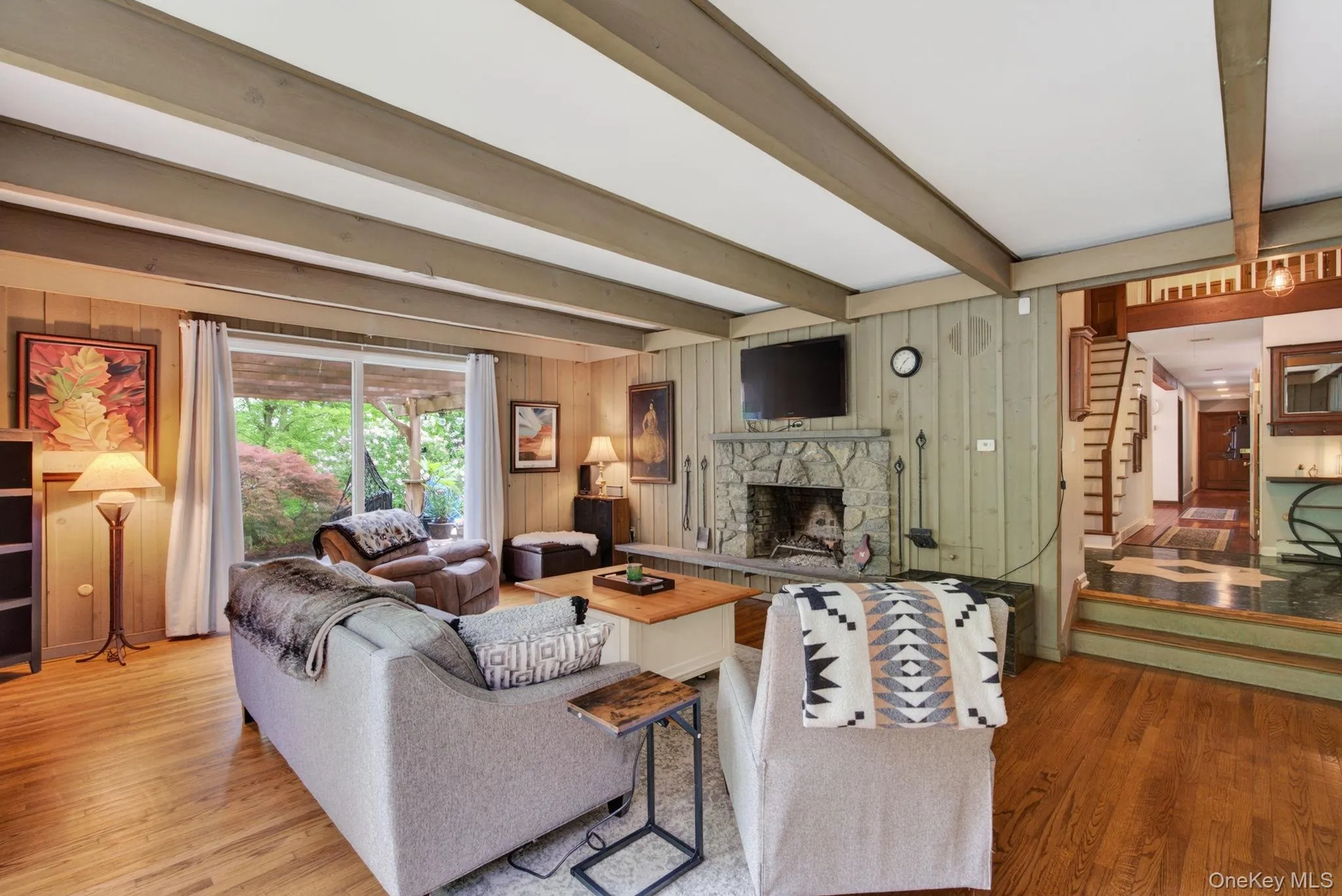 Living Room with fireplace and glass sliders Living Room with fireplace and glass sliders