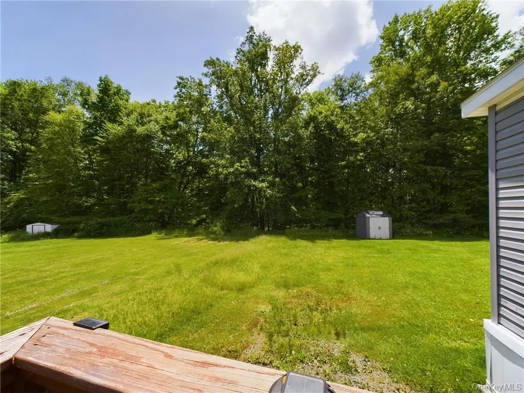 View of yard featuring a storage shed View of yard featuring a storage shed