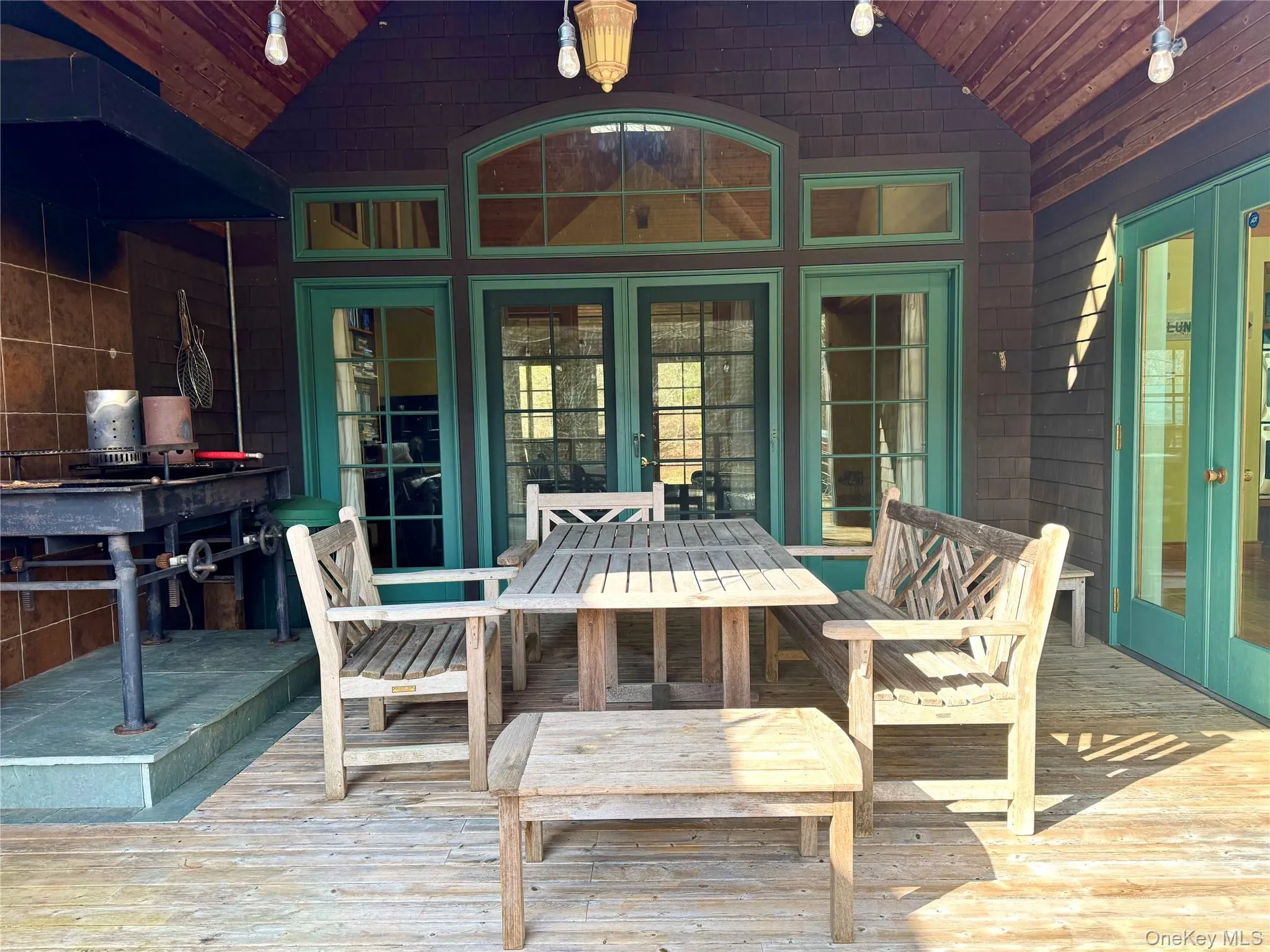 Covered Back Porch that Overlooks Pond Covered Back Porch that Overlooks Pond