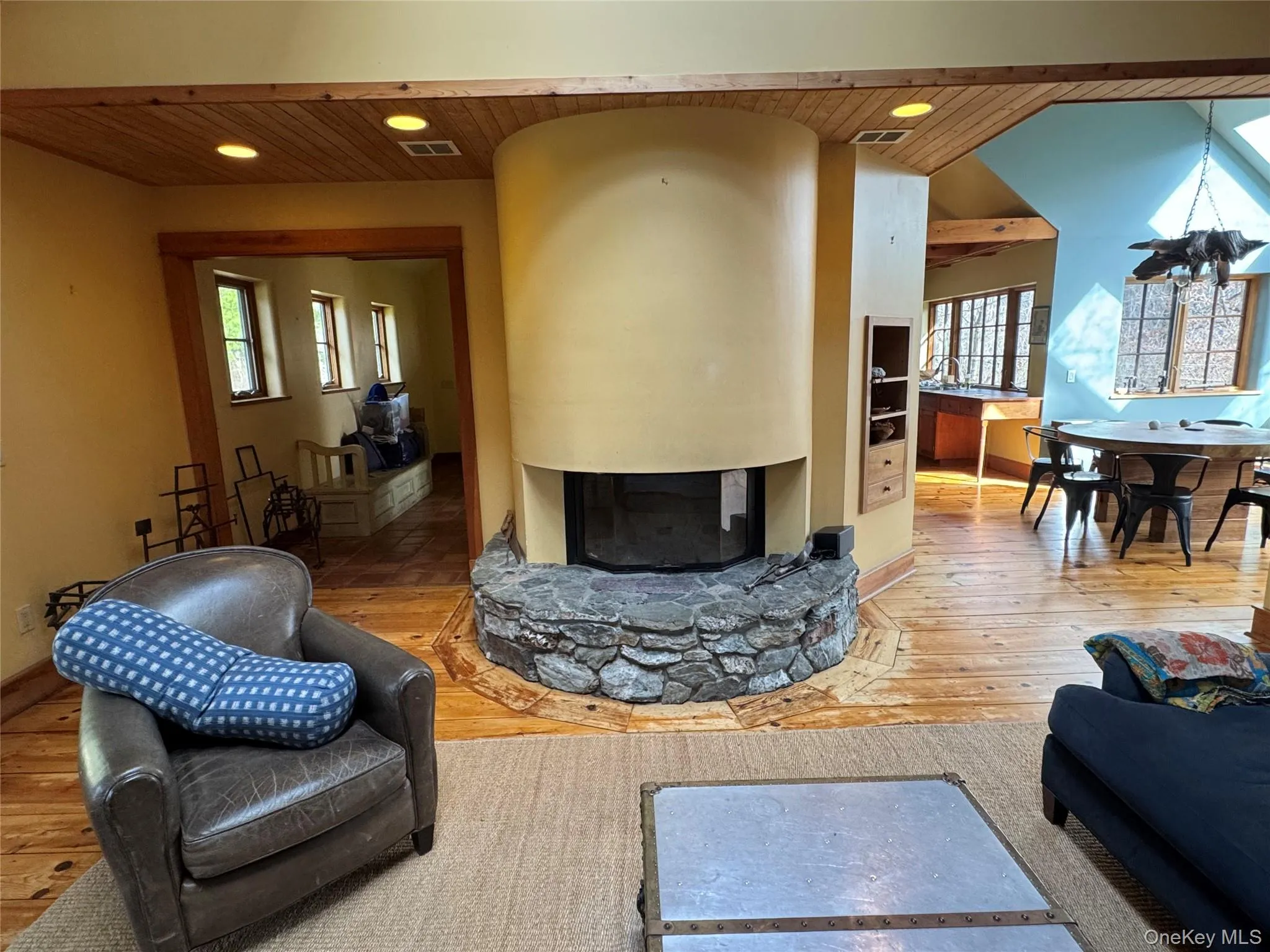 Wood Burning Fireplace & Opens to Dining Area Wood Burning Fireplace & Opens to Dining Area