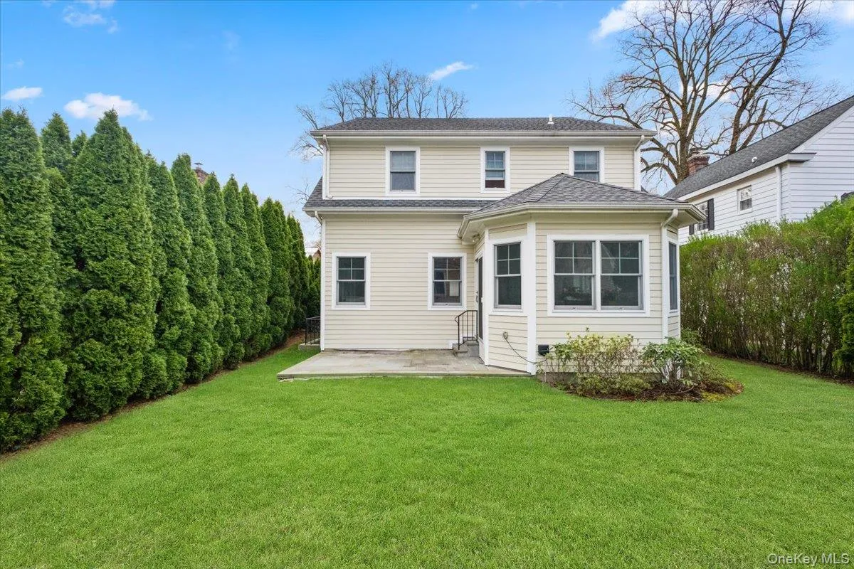 View of yard and stone patio, perfect for friends and family to gather View of yard and stone patio, perfect for friends and family to gather