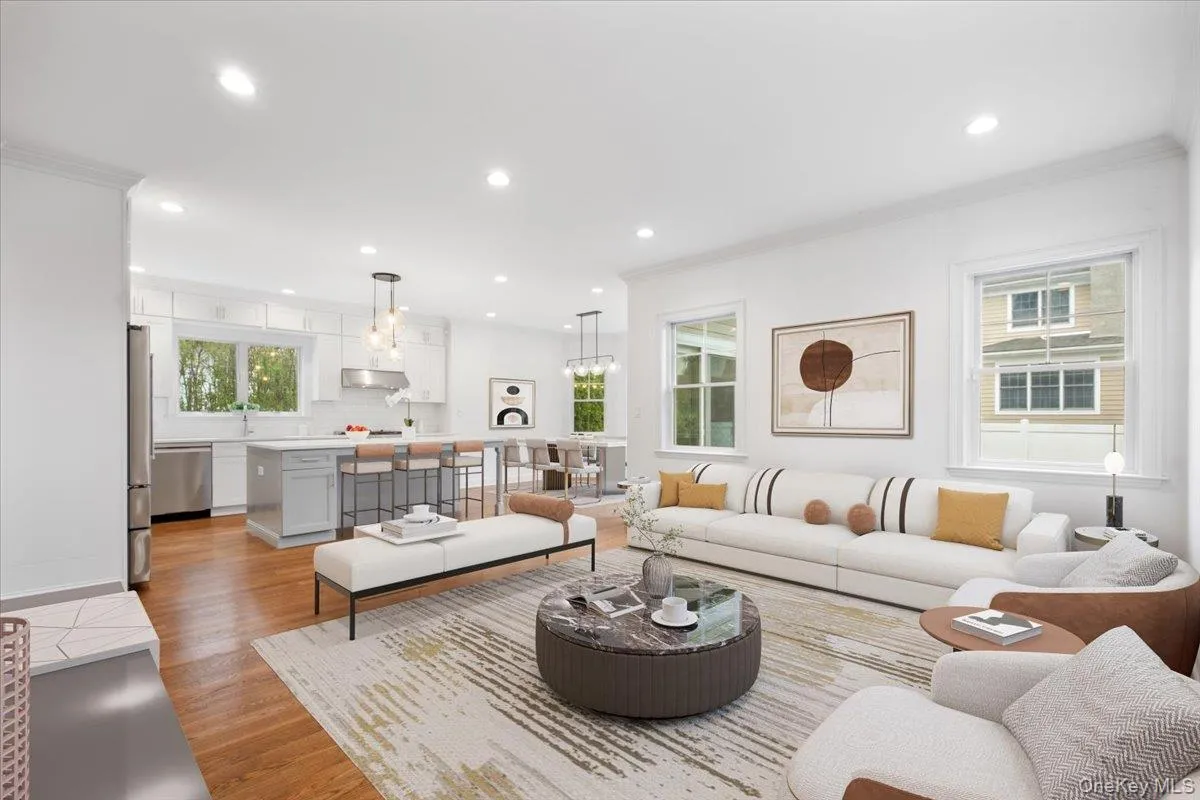 Virtually staged kitchen/ family room Virtually staged kitchen/ family room