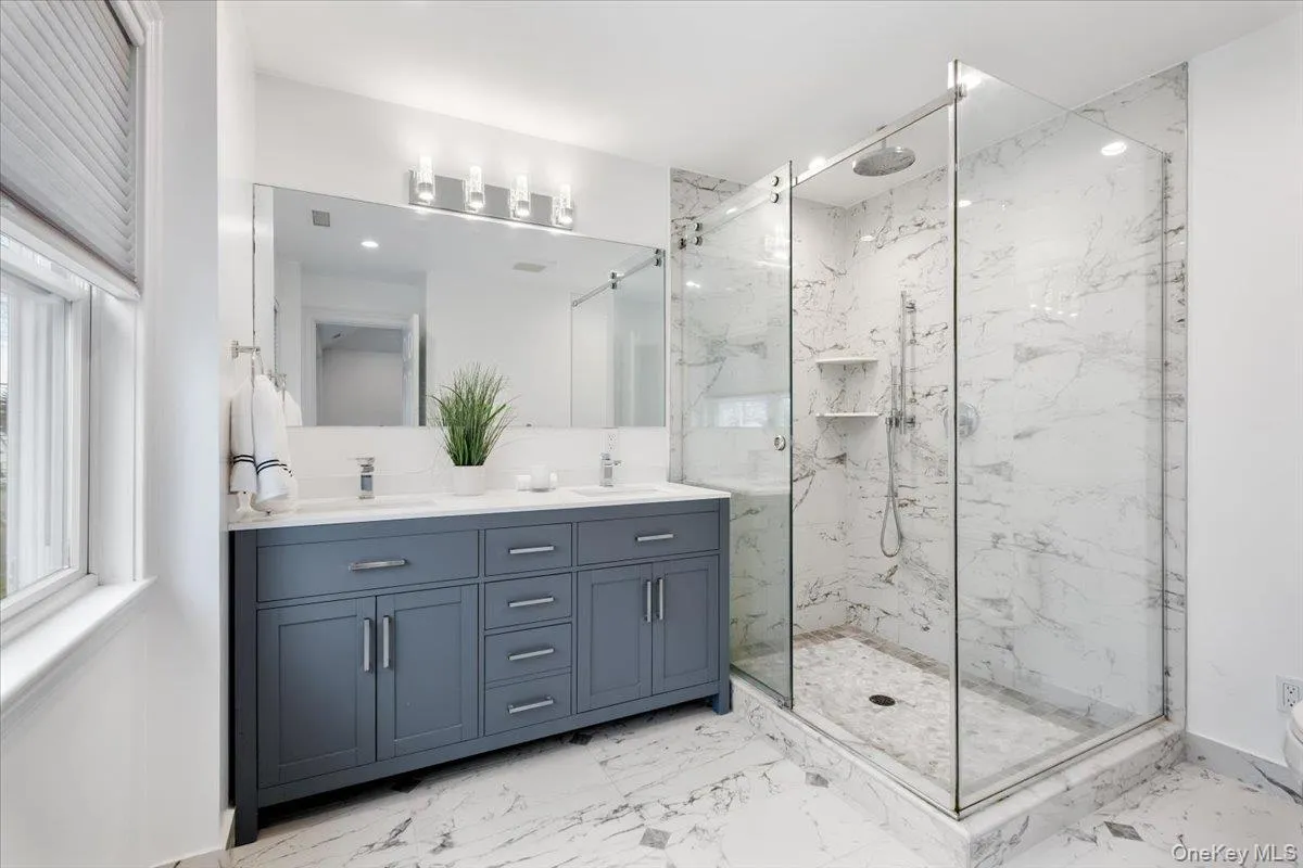 Luxurious primary bath with two sinks Luxurious primary bath with two sinks