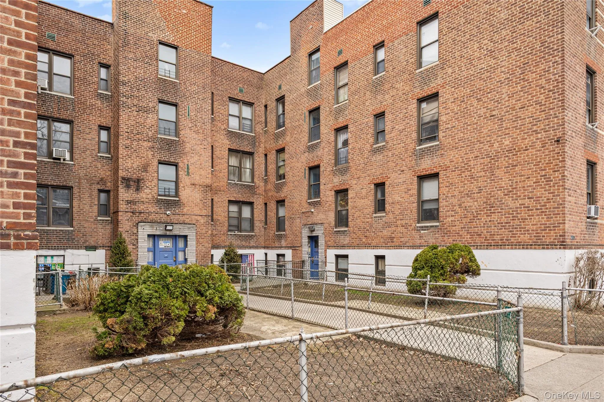 This Barker Avenue co-op has three buildings around a central courtyard. This Barker Avenue co-op has three buildings around a central courtyard.