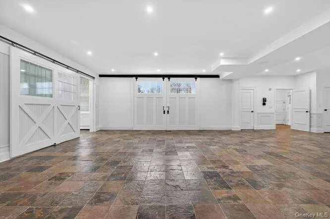 First floor entertainment space with full bath, kitchen adn laundry First floor entertainment space with full bath, kitchen adn laundry