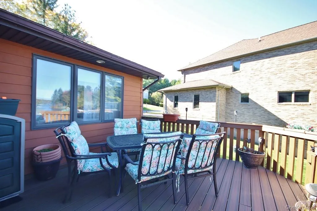 Deck featuring outdoor dining area Deck featuring outdoor dining area
