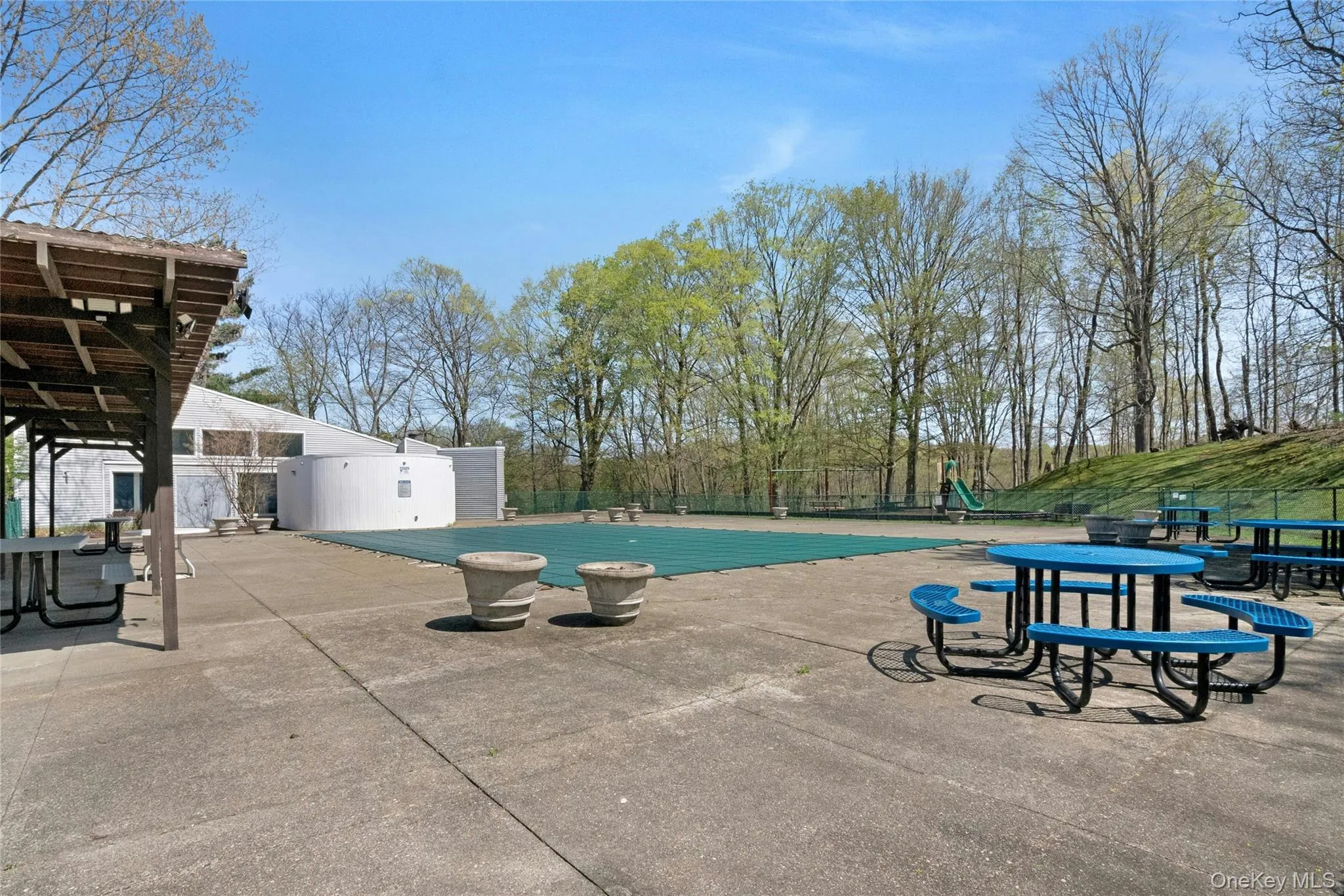 Pool recreational area with attached clubhouse Pool recreational area with attached clubhouse