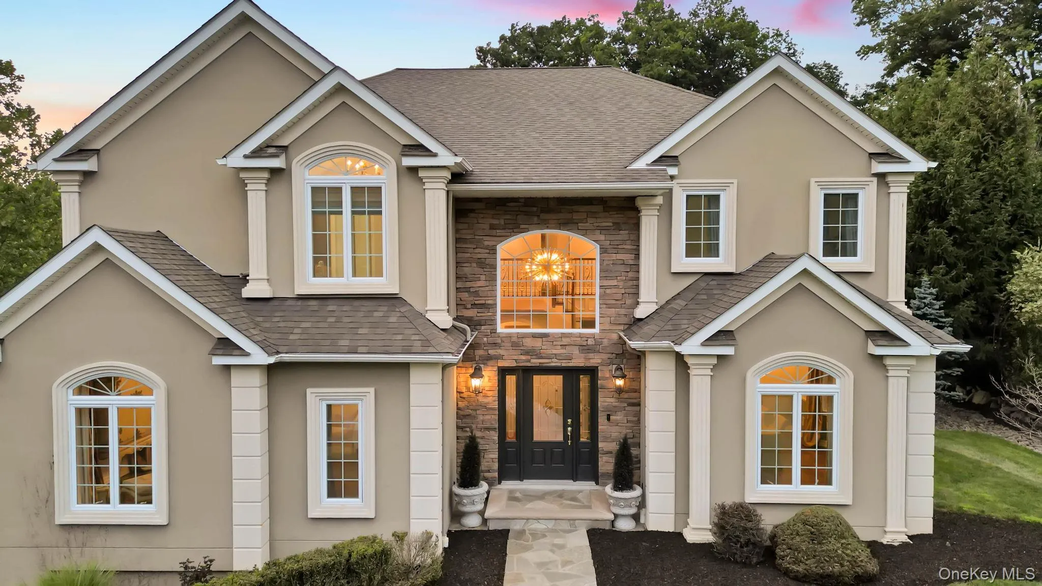 Beautiful detailing as seen with multiple angles cutouts oversized windows and lovely entry Beautiful detailing as seen with multiple angles cutouts oversized windows and lovely entry