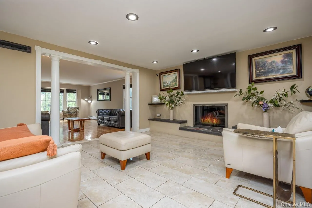 Den off kitchen with electric fireplace Den off kitchen with electric fireplace