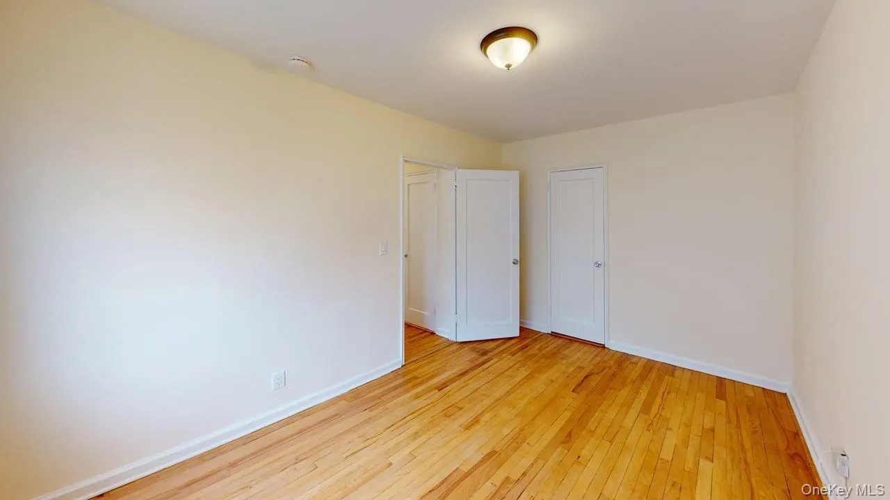 This 2nd Bedroom has been freshly painted with wood floors. This 2nd Bedroom has been freshly painted with wood floors.