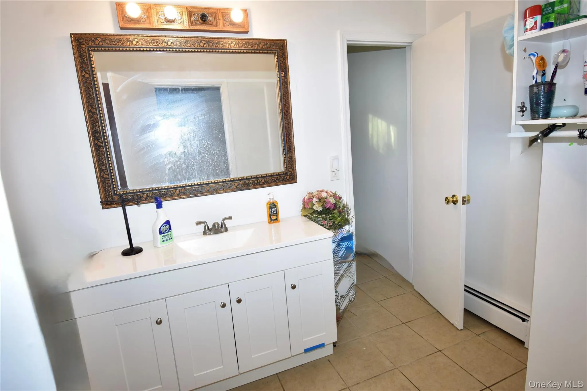 2nd level bathroom with view of dressing area leading into addition bathroom space 2nd level bathroom with view of dressing area leading into addition bathroom space