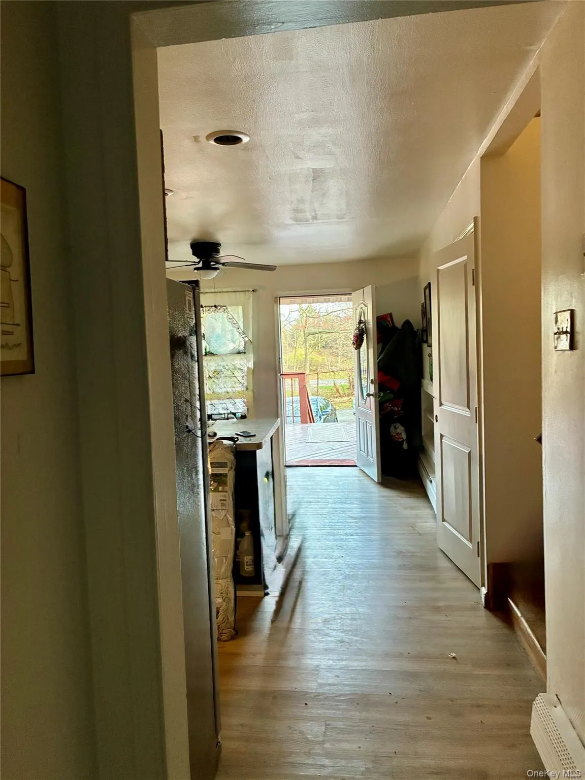 Main entry with full bath to the left kitchen with deck straight ahead Main entry with full bath to the left kitchen with deck straight ahead