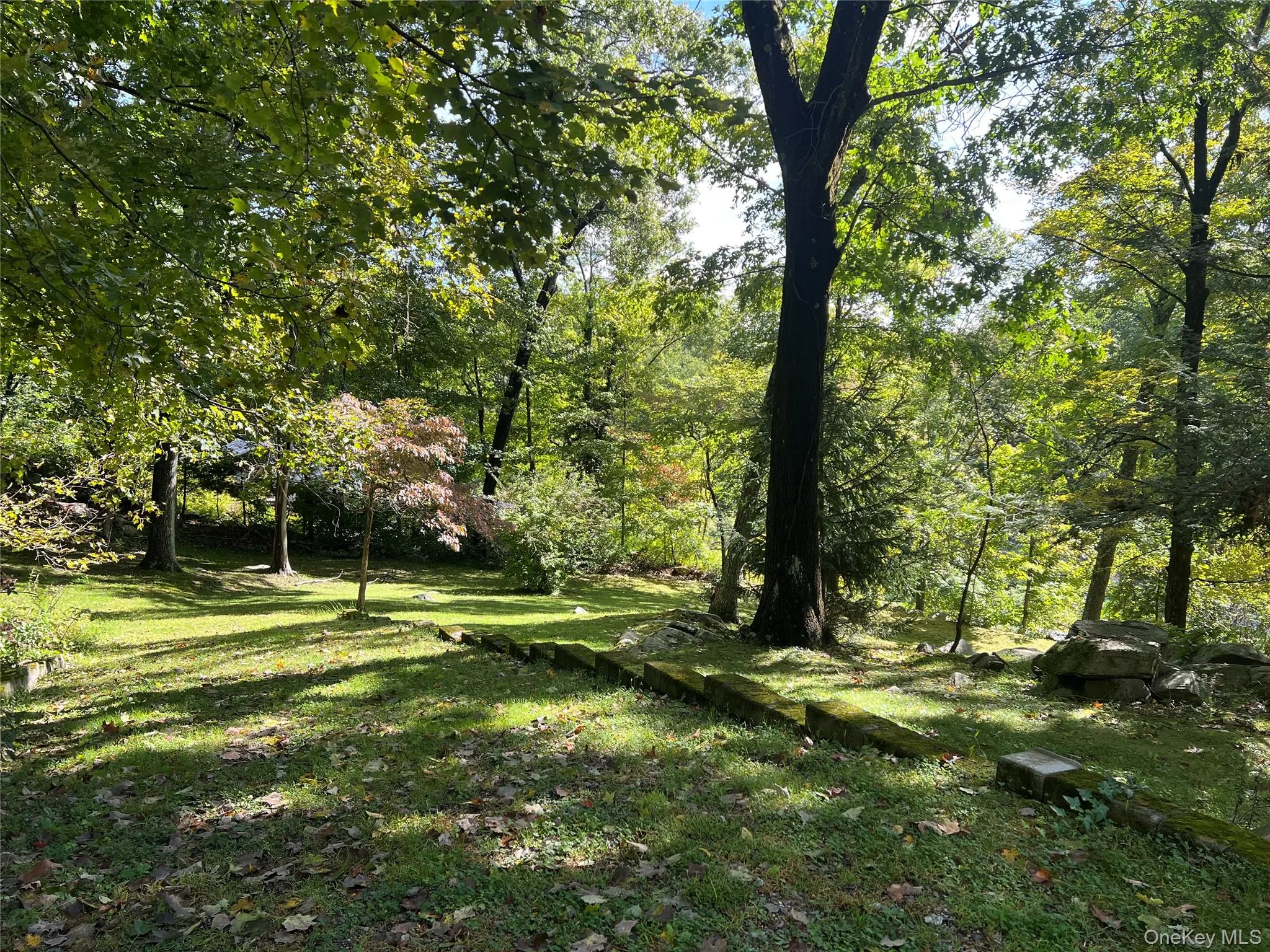 Don't miss the side yard past the barn, dappled light and a nice wide path Don't miss the side yard past the barn, dappled light and a nice wide path