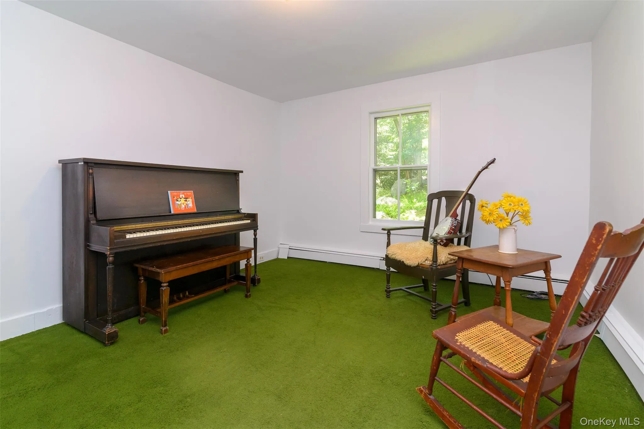 Cheerful space with view of side and back yard Cheerful space with view of side and back yard