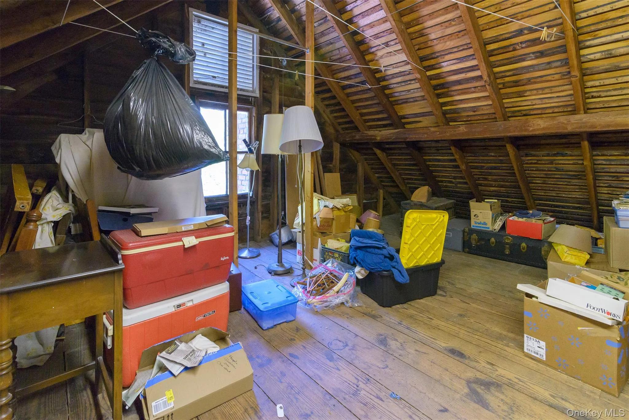 Walk up attic has plenty of storage space Walk up attic has plenty of storage space
