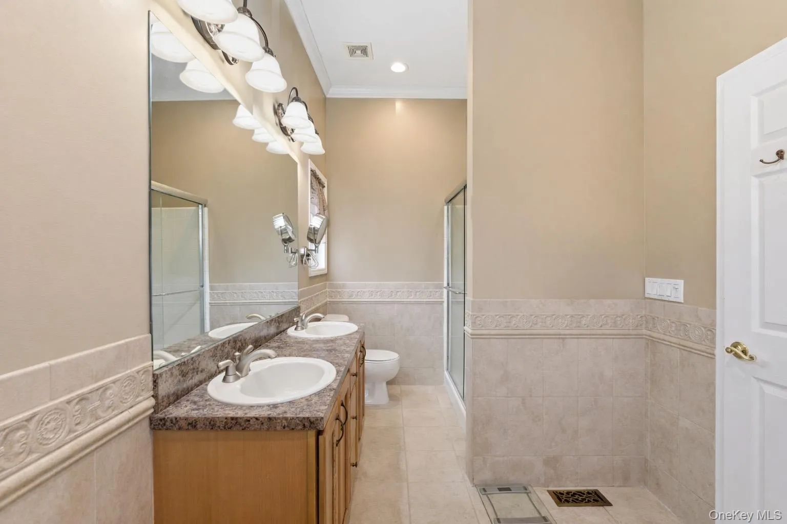 1st floor primary bath with double vanity and shower 1st floor primary bath with double vanity and shower