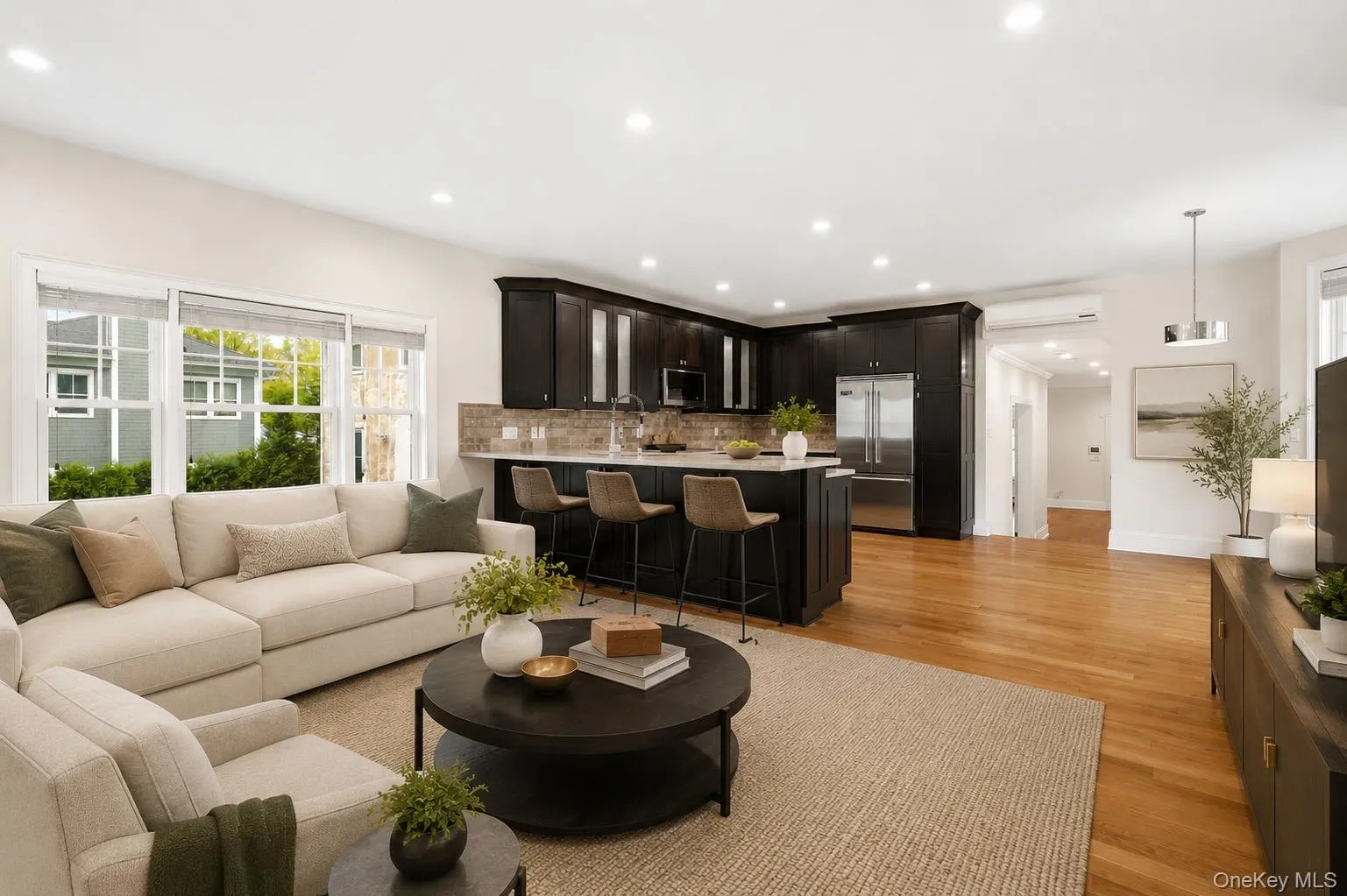 Kitchen open to family room virtually staged Kitchen open to family room virtually staged