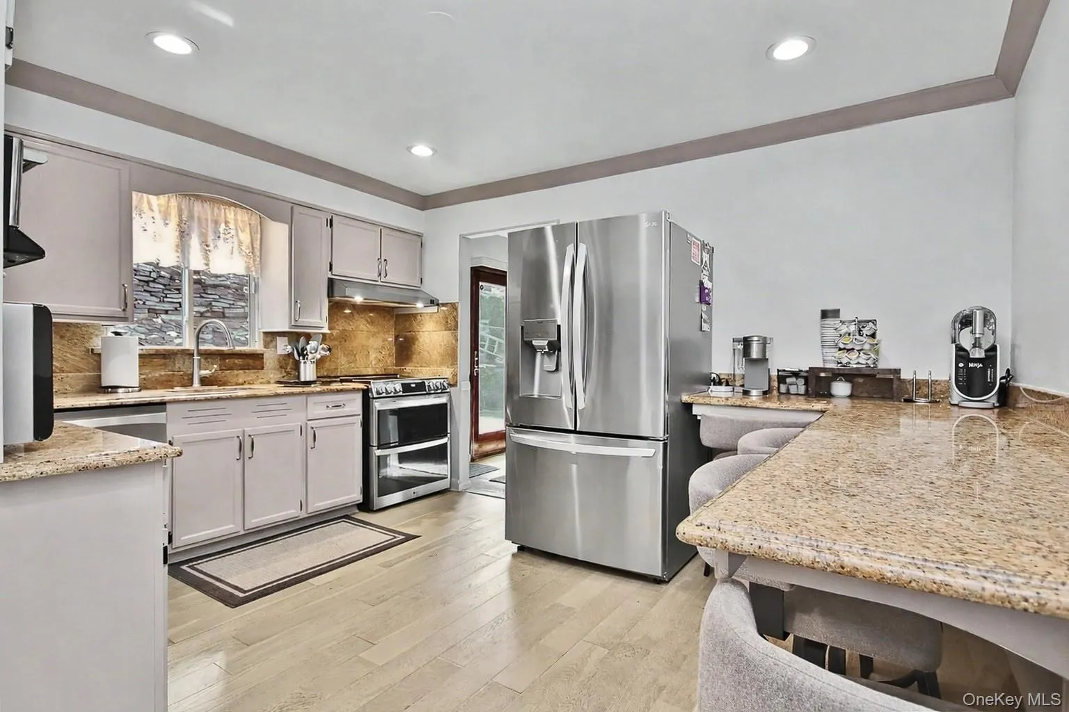 Tastefully updated kitchen. Lots of light and lots of space. Tastefully updated kitchen. Lots of light and lots of space.