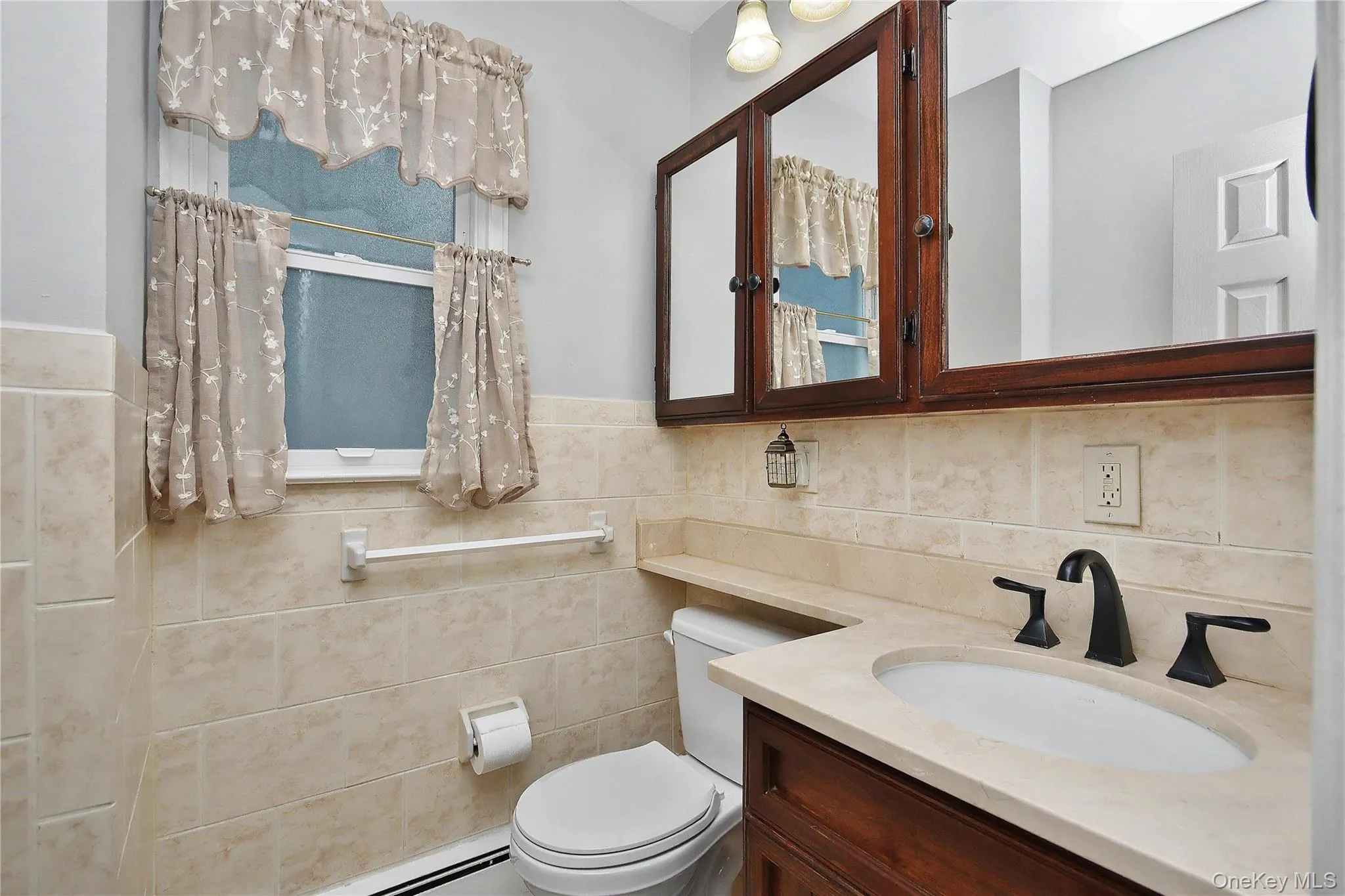 Half-bath off kitchen Half-bath off kitchen