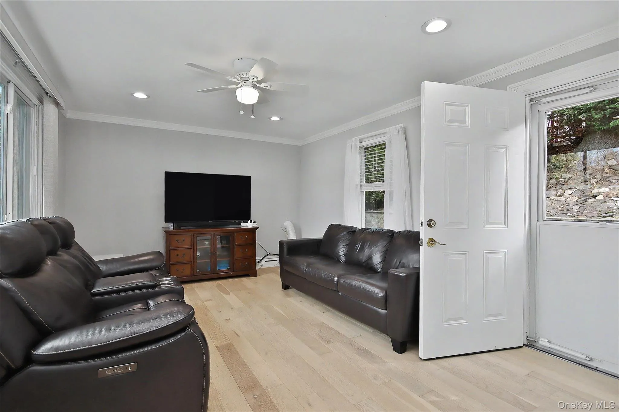 Family Room with door out to backyard Family Room with door out to backyard