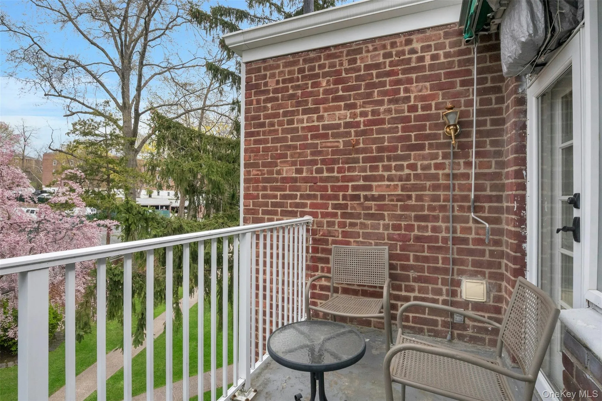 Living room opens to cozy balcony Living room opens to cozy balcony