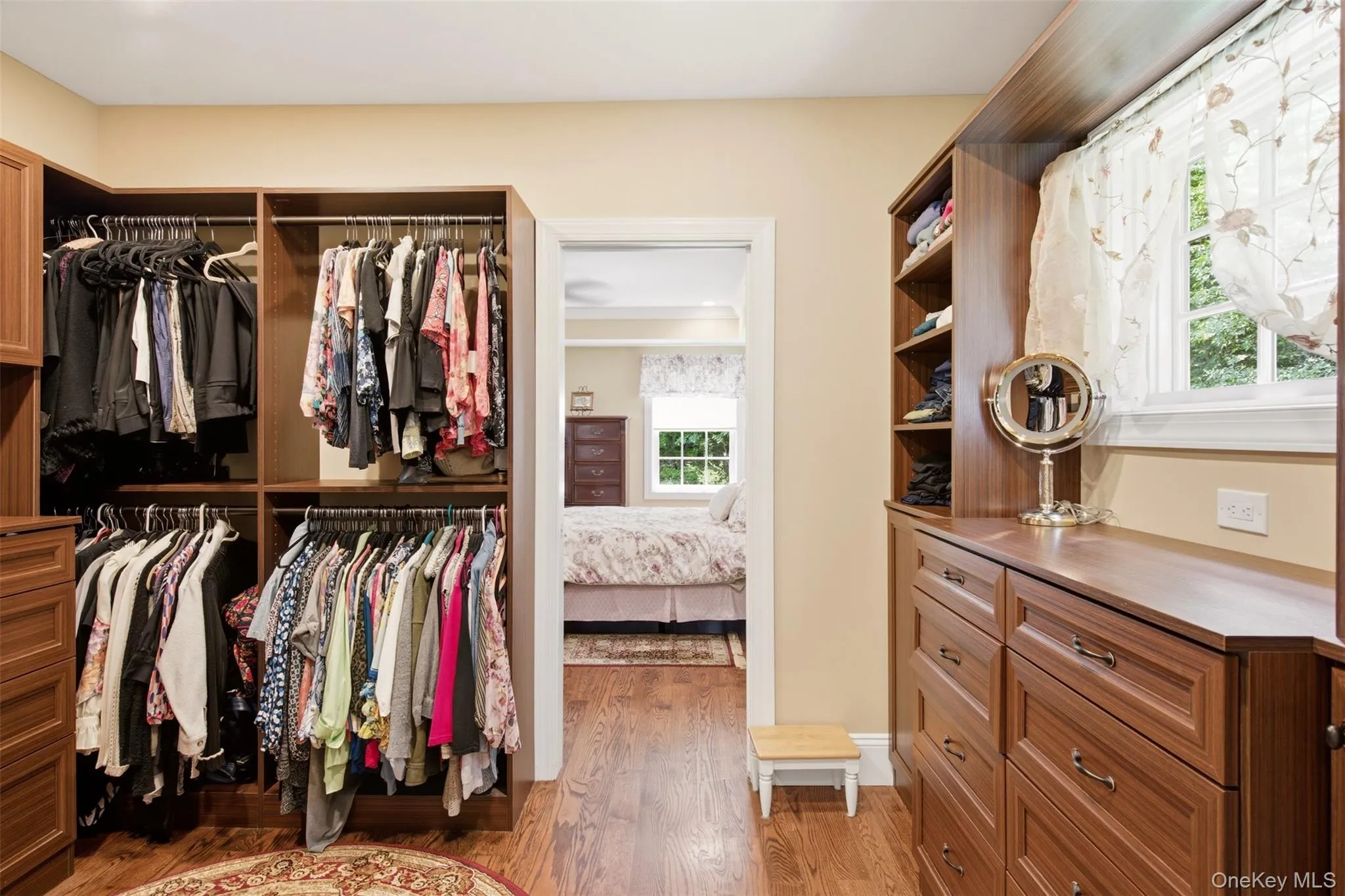 Primary walk-in closet Primary walk-in closet
