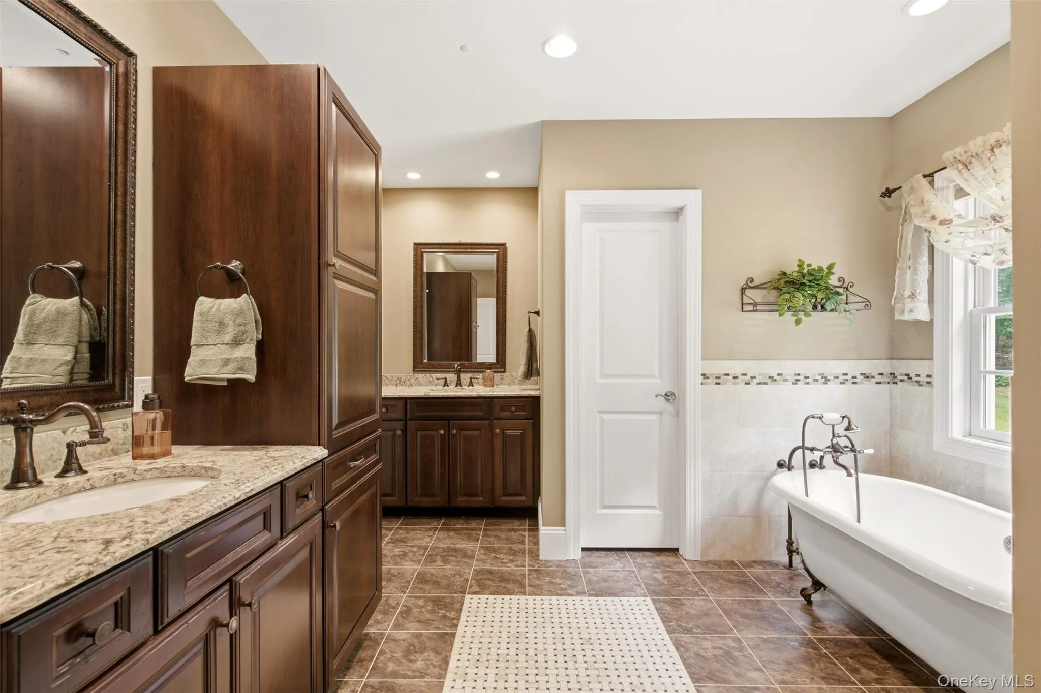 Free-standing tub, privacy toilet Free-standing tub, privacy toilet