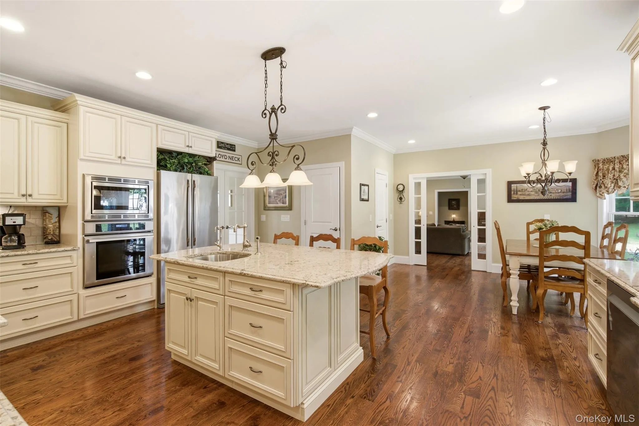 Eat in kitchen with glass doors open to family room Eat in kitchen with glass doors open to family room