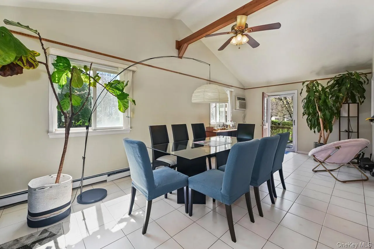 Currently being used as dining room. Door leads to patio and yard. Currently being used as dining room. Door leads to patio and yard.