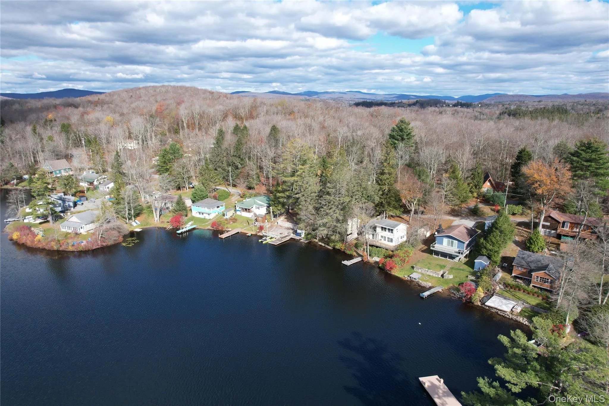 Aerial view of property's location with a mountainous background Aerial view of property's location with a mountainous background