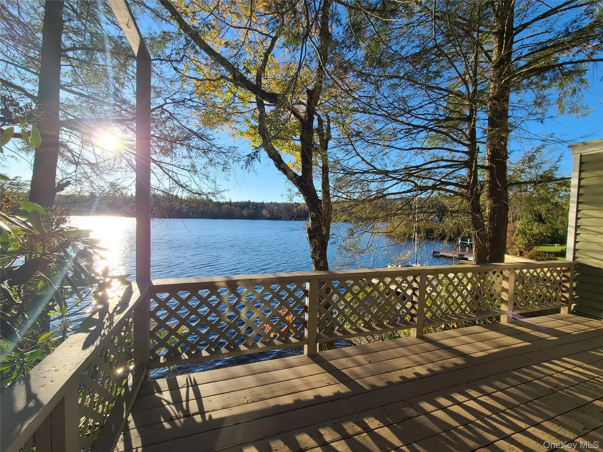 Deck featuring a water view Deck featuring a water view