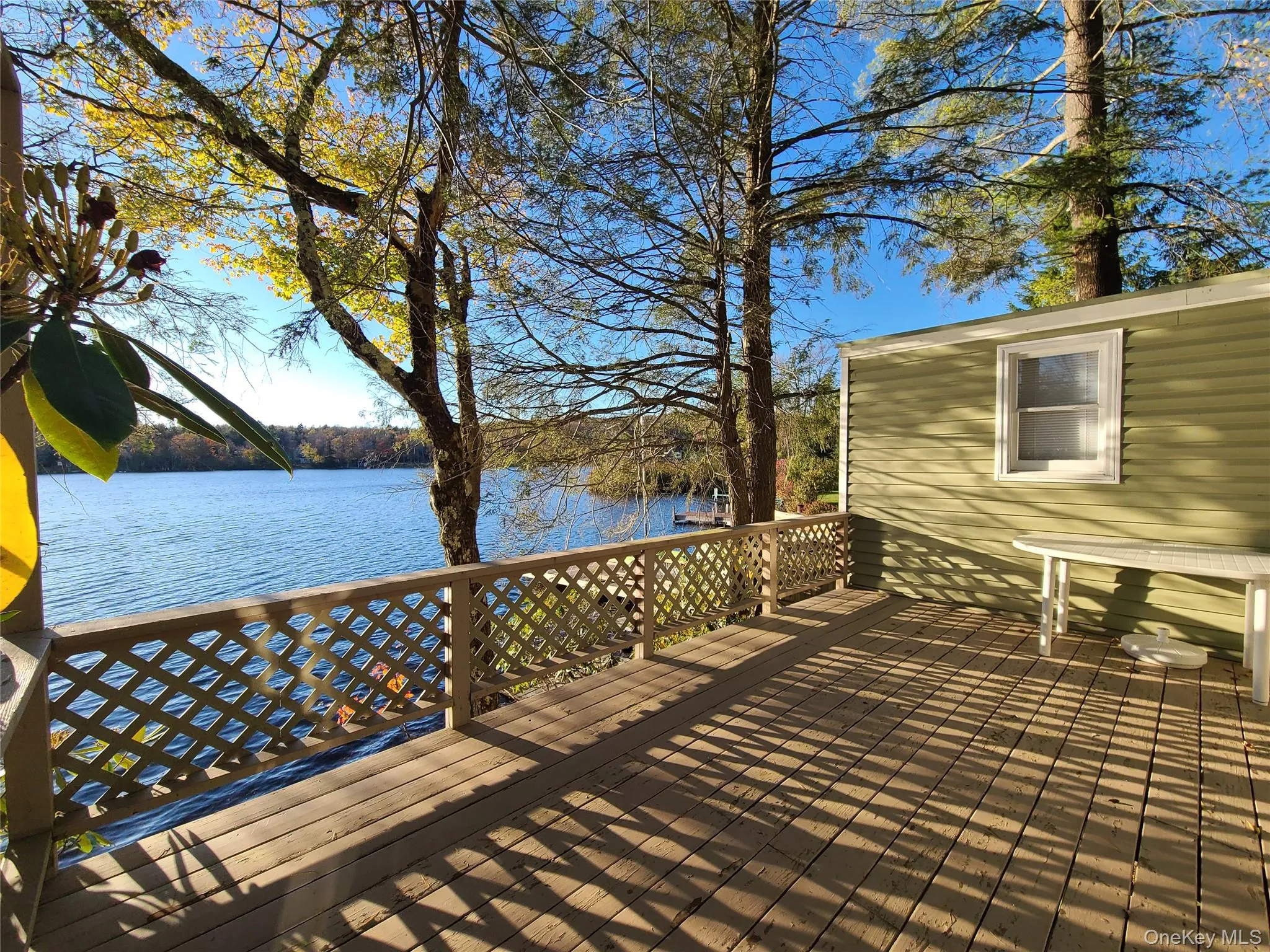 Deck featuring a water view Deck featuring a water view